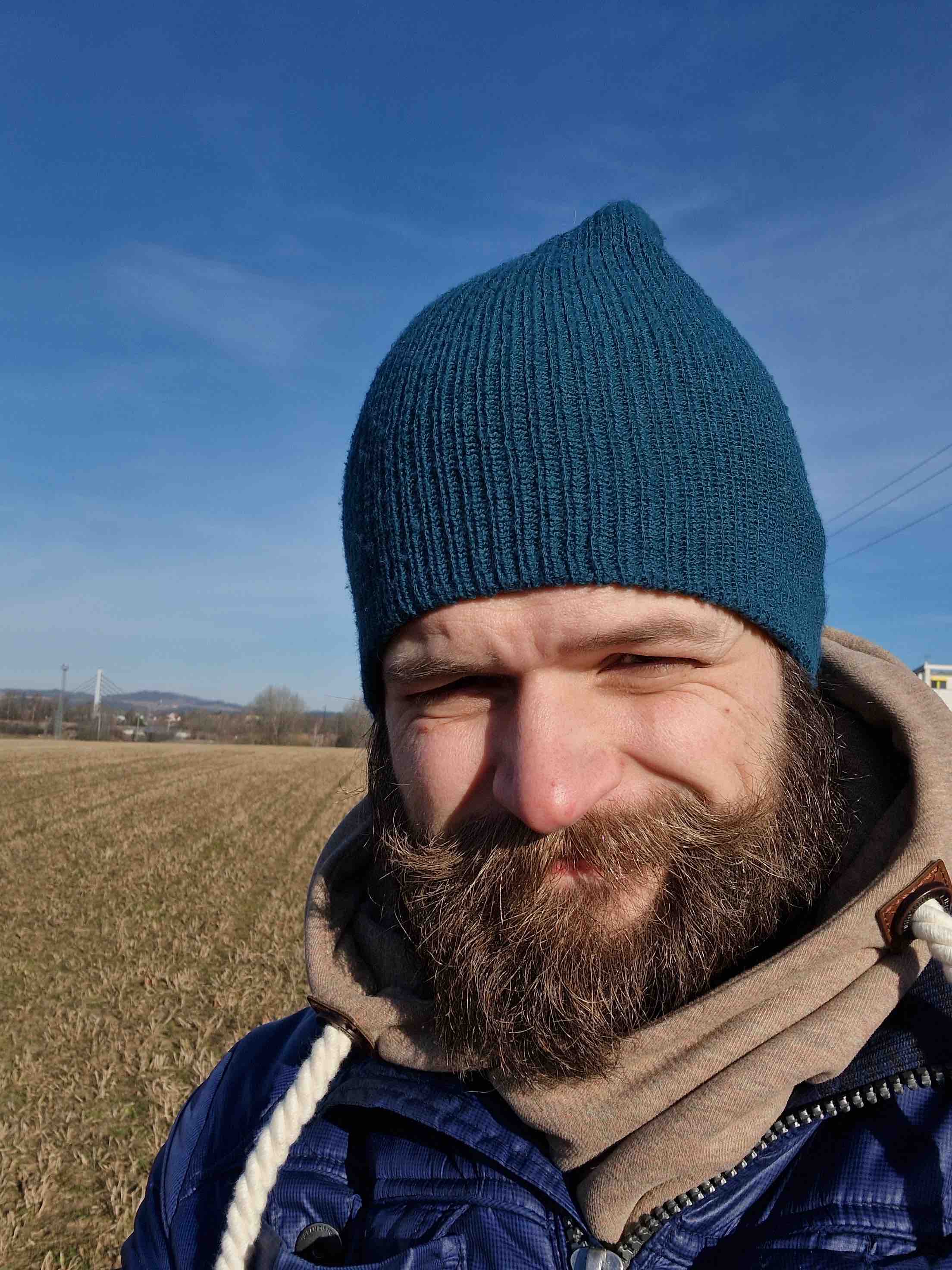 man blue hat outdoors