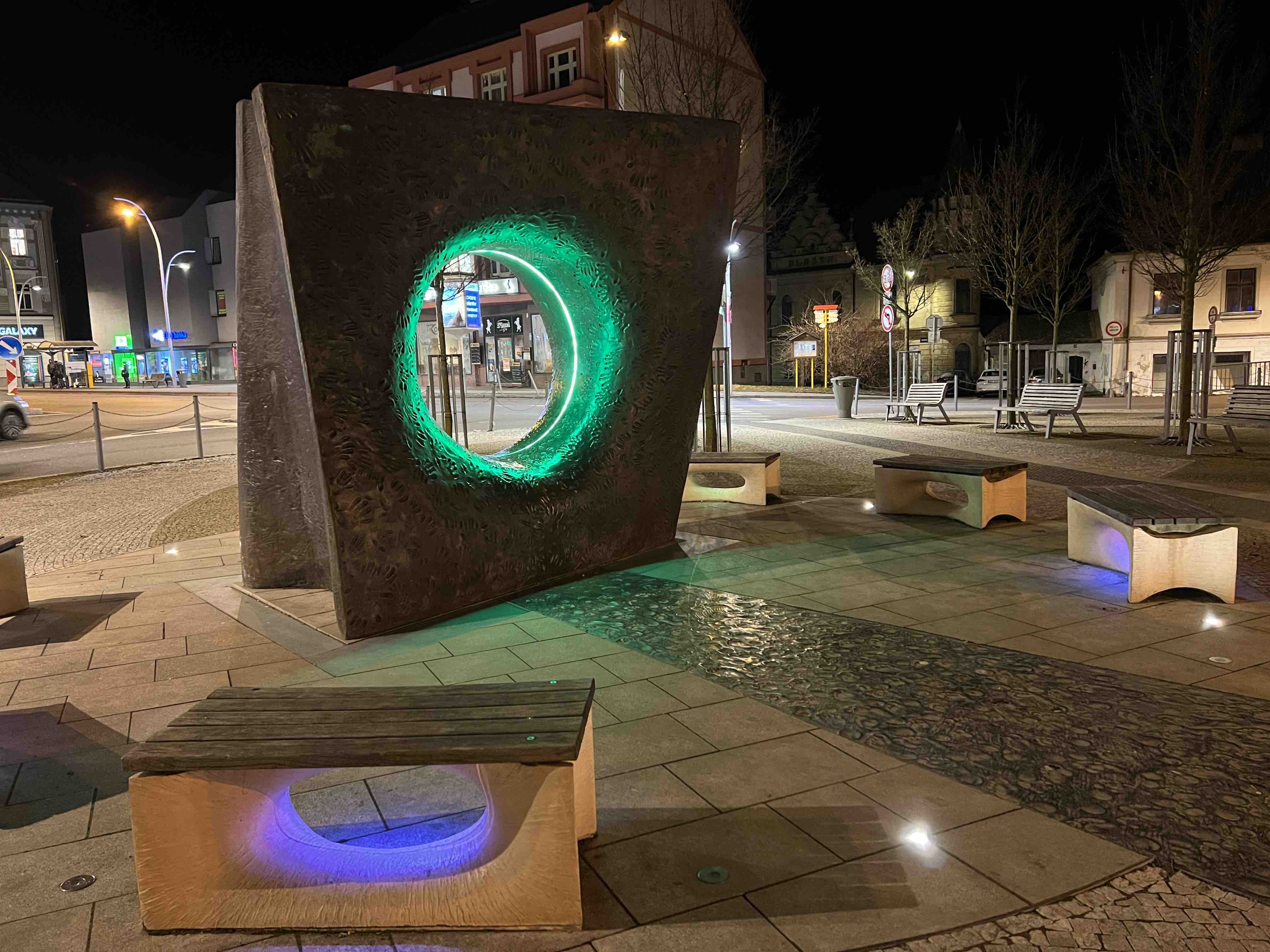 modern sculpture with benches