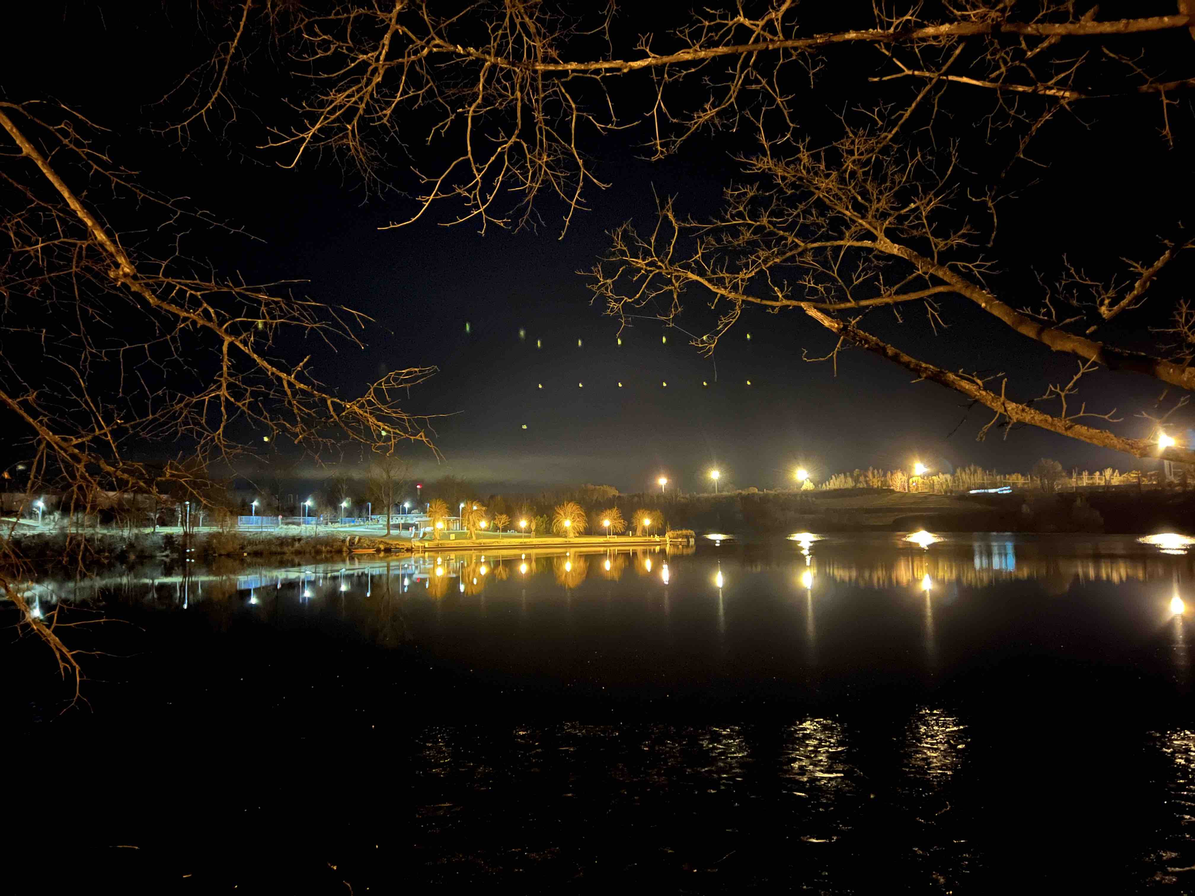 night lake reflection with lights