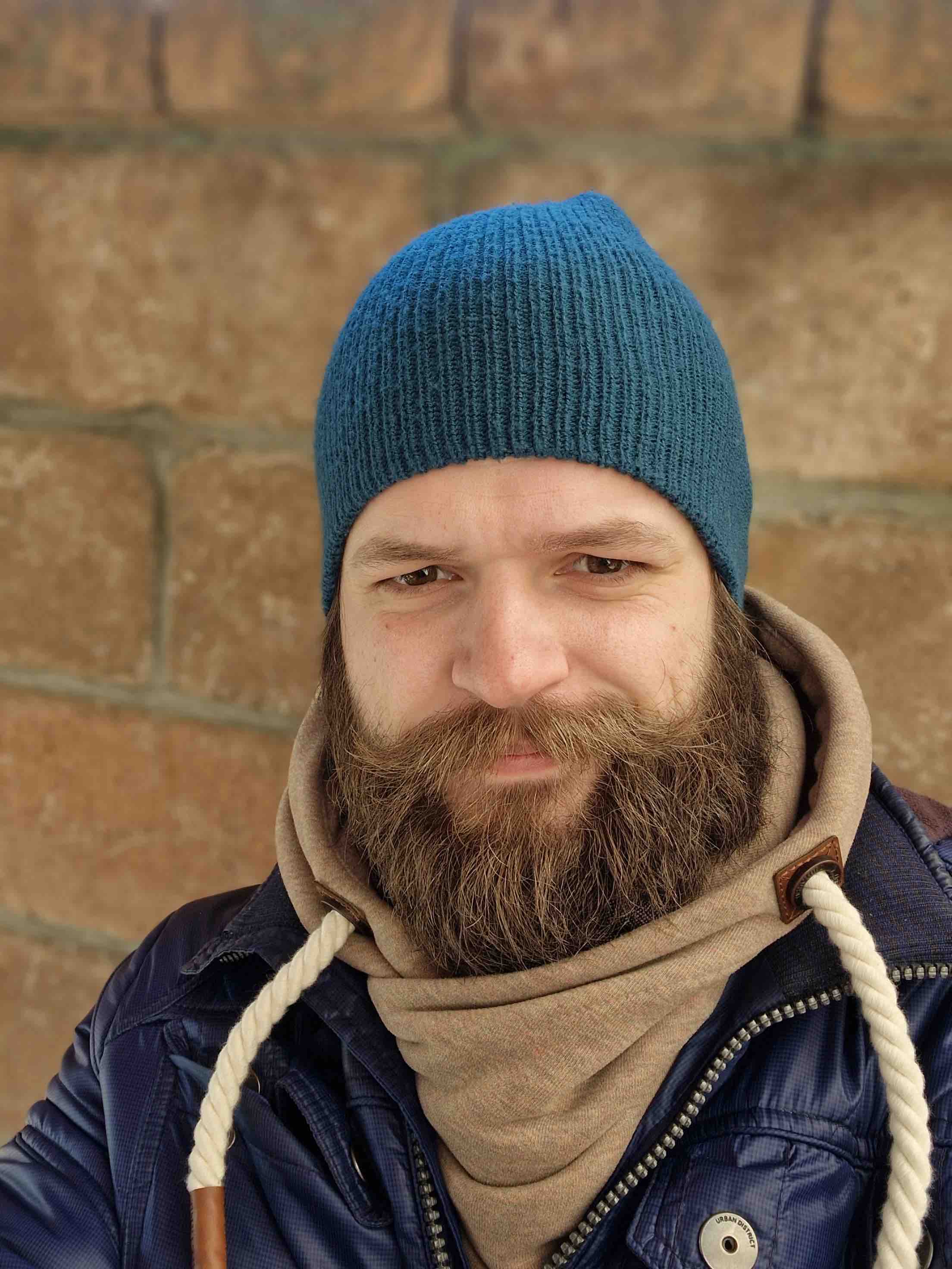 person wearing blue beanie