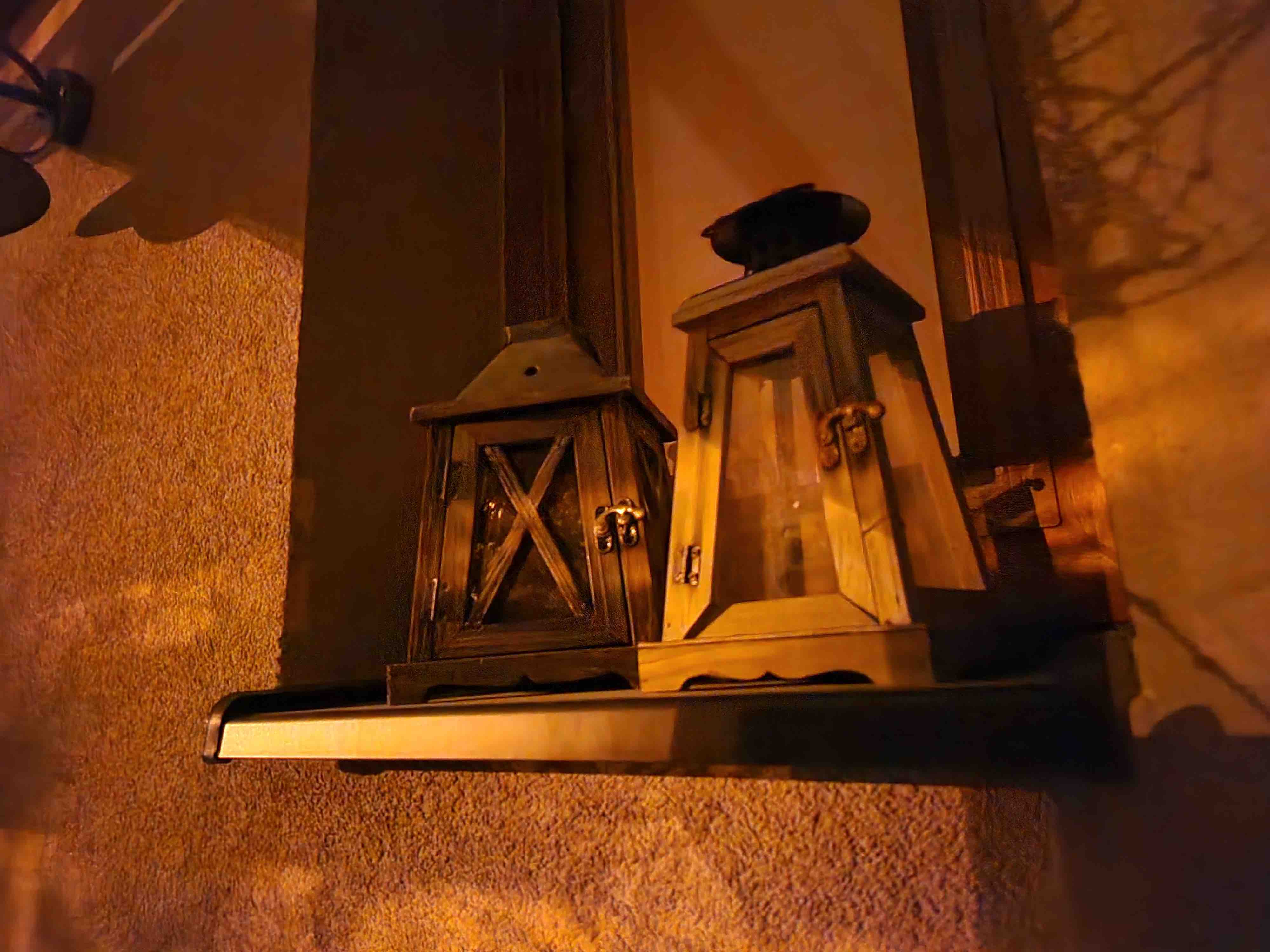 wooden lanterns on shelf