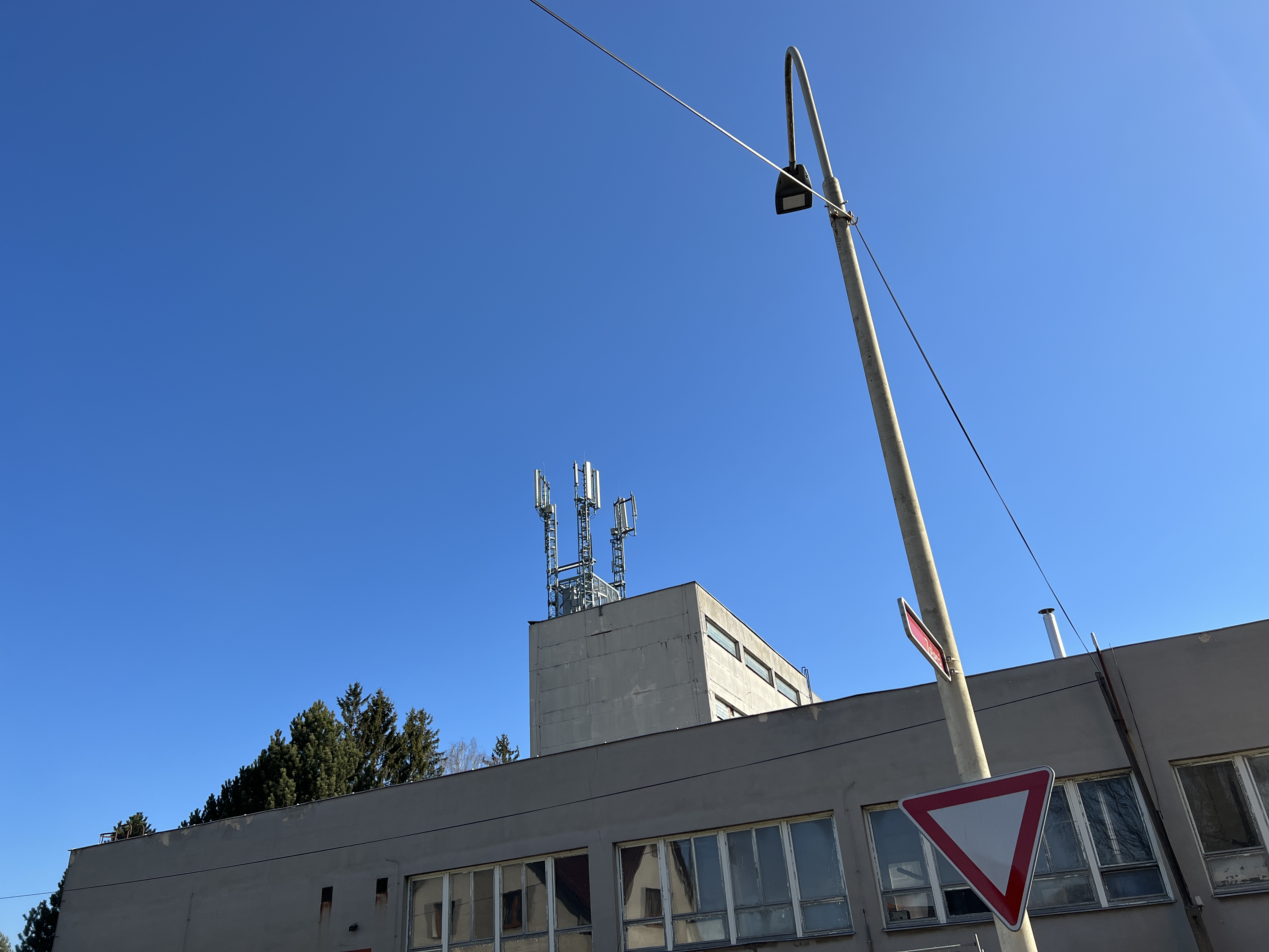 building with antenna and sign