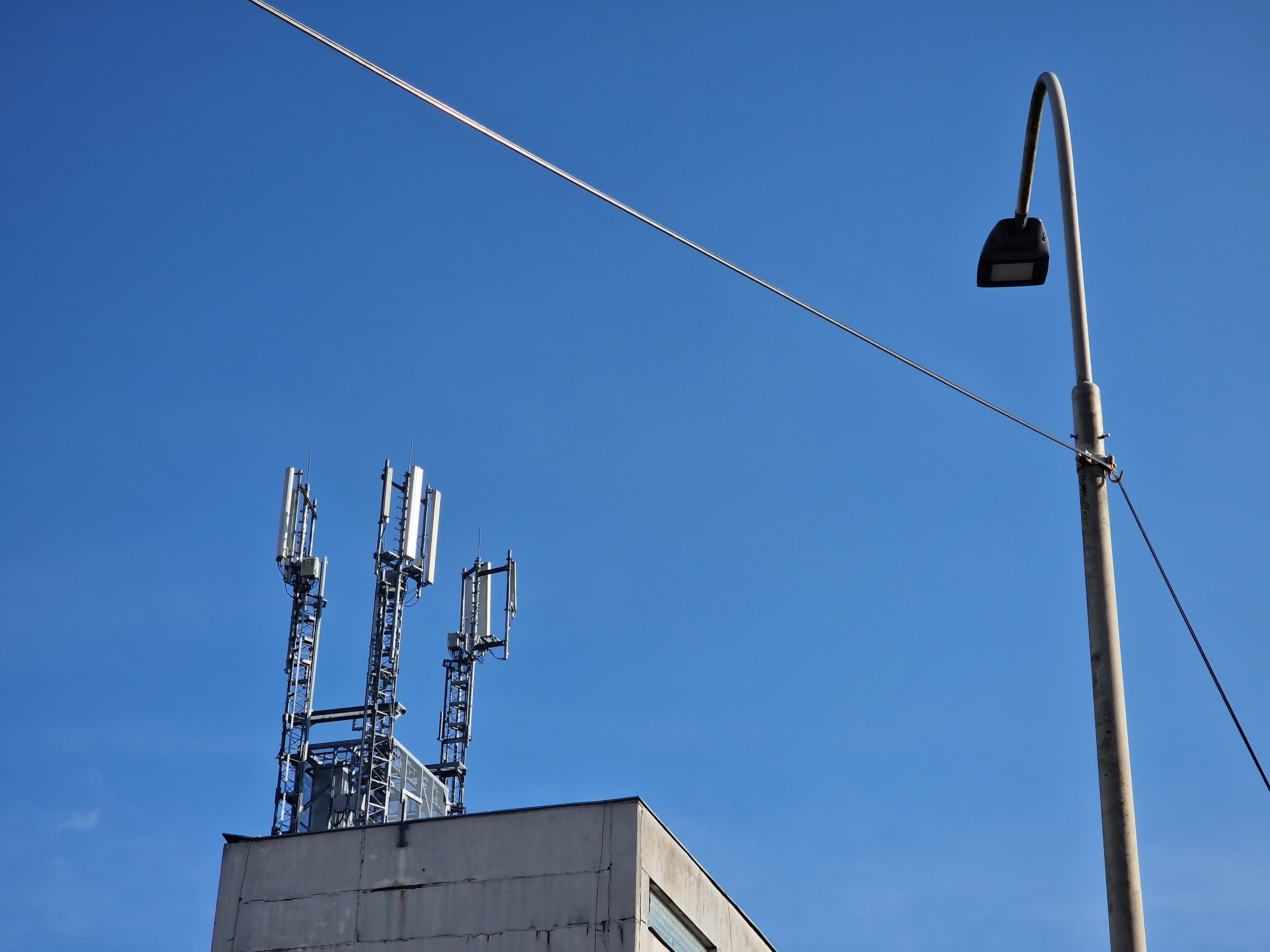 cell tower and streetlight