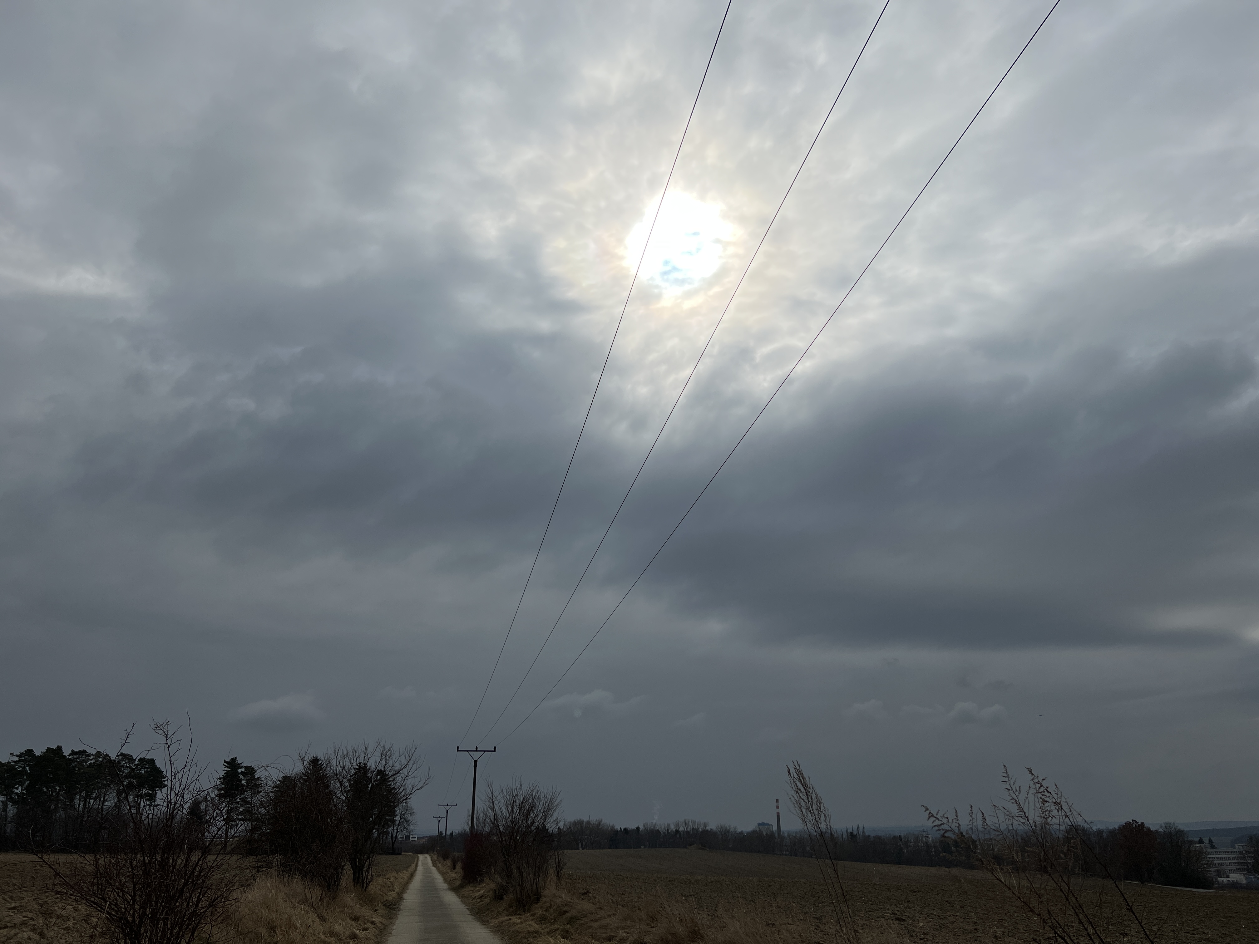 cloudy sky power lines