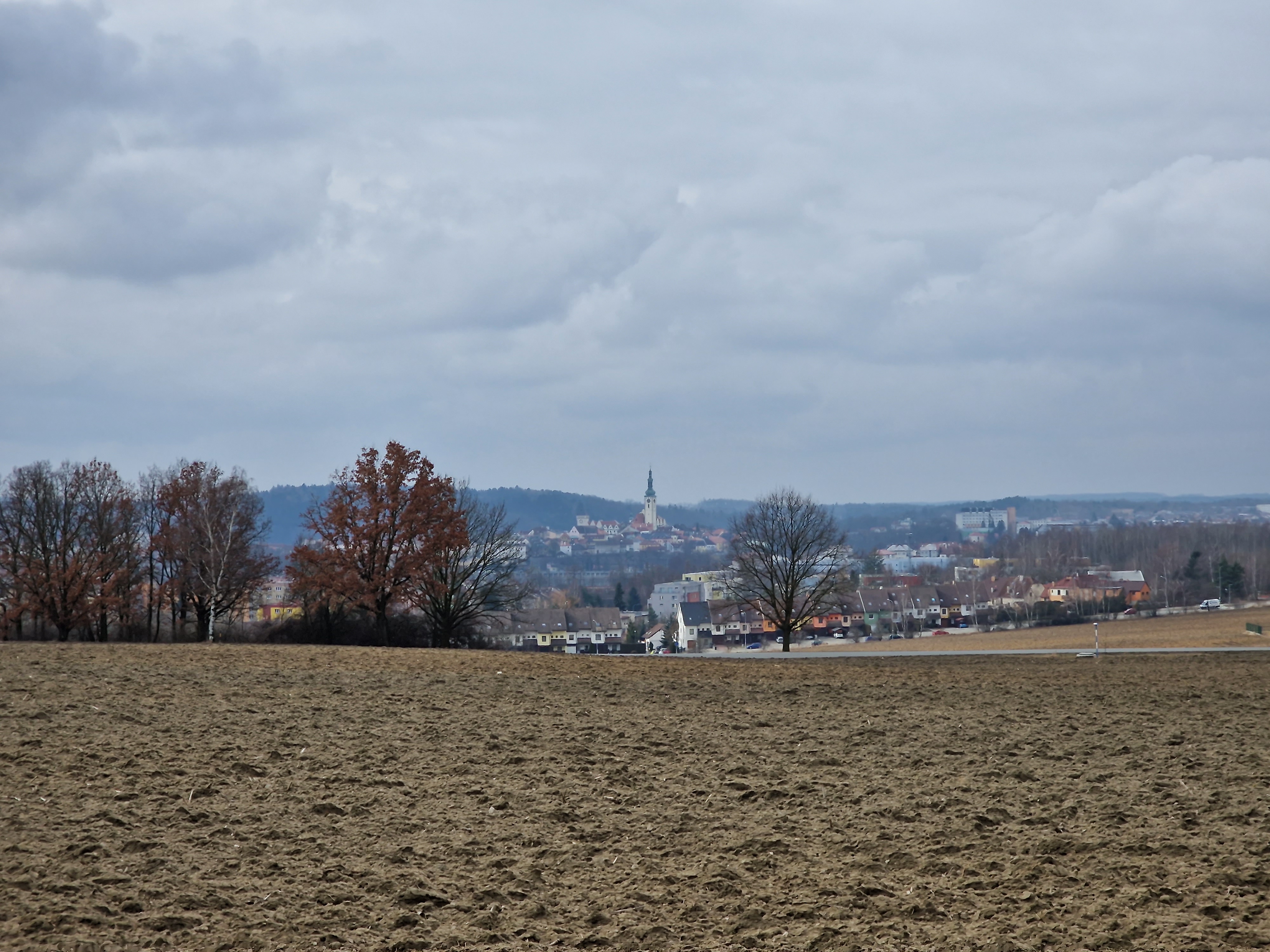 distant town view with cloudy sky