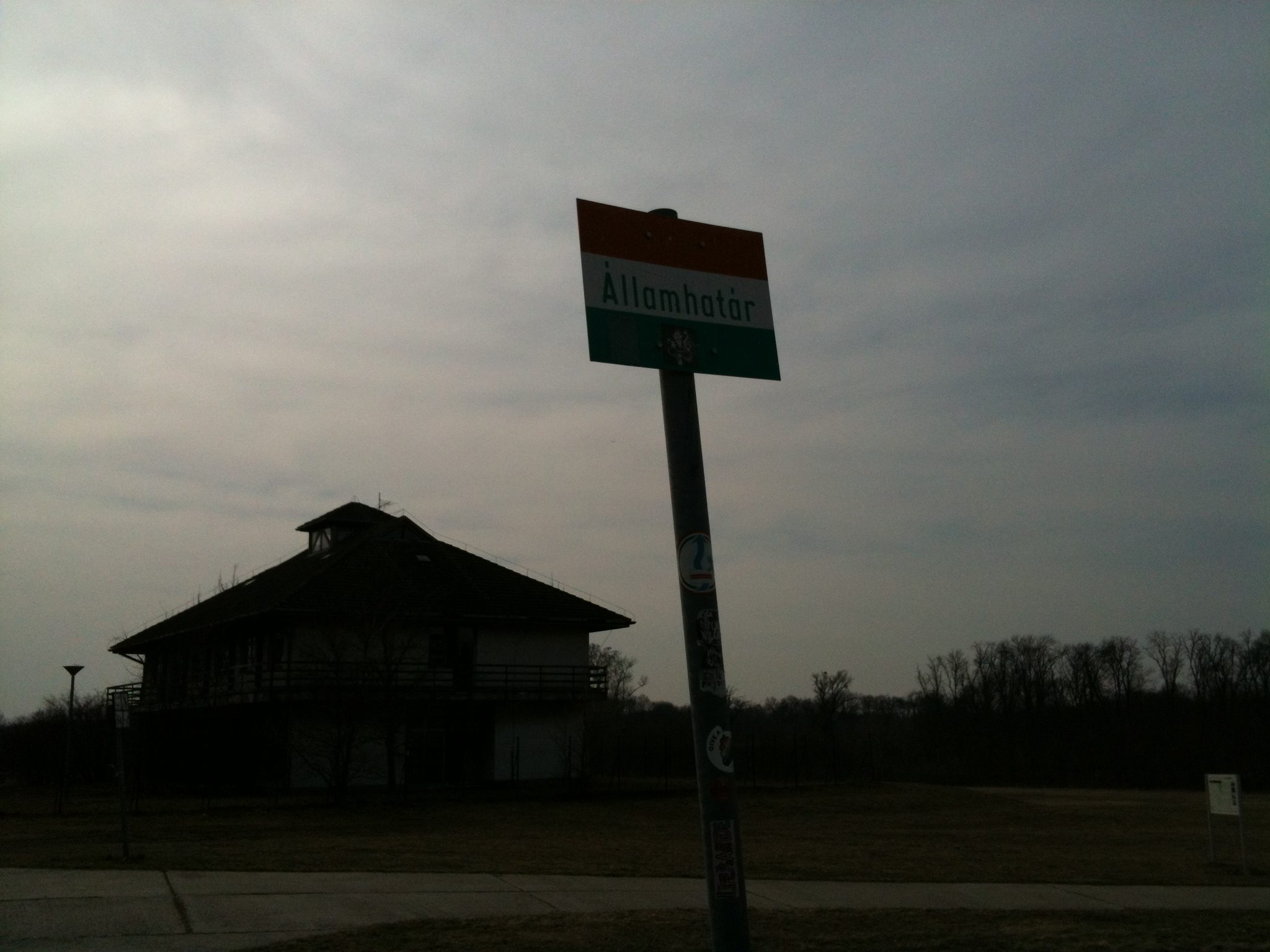 signpost near building