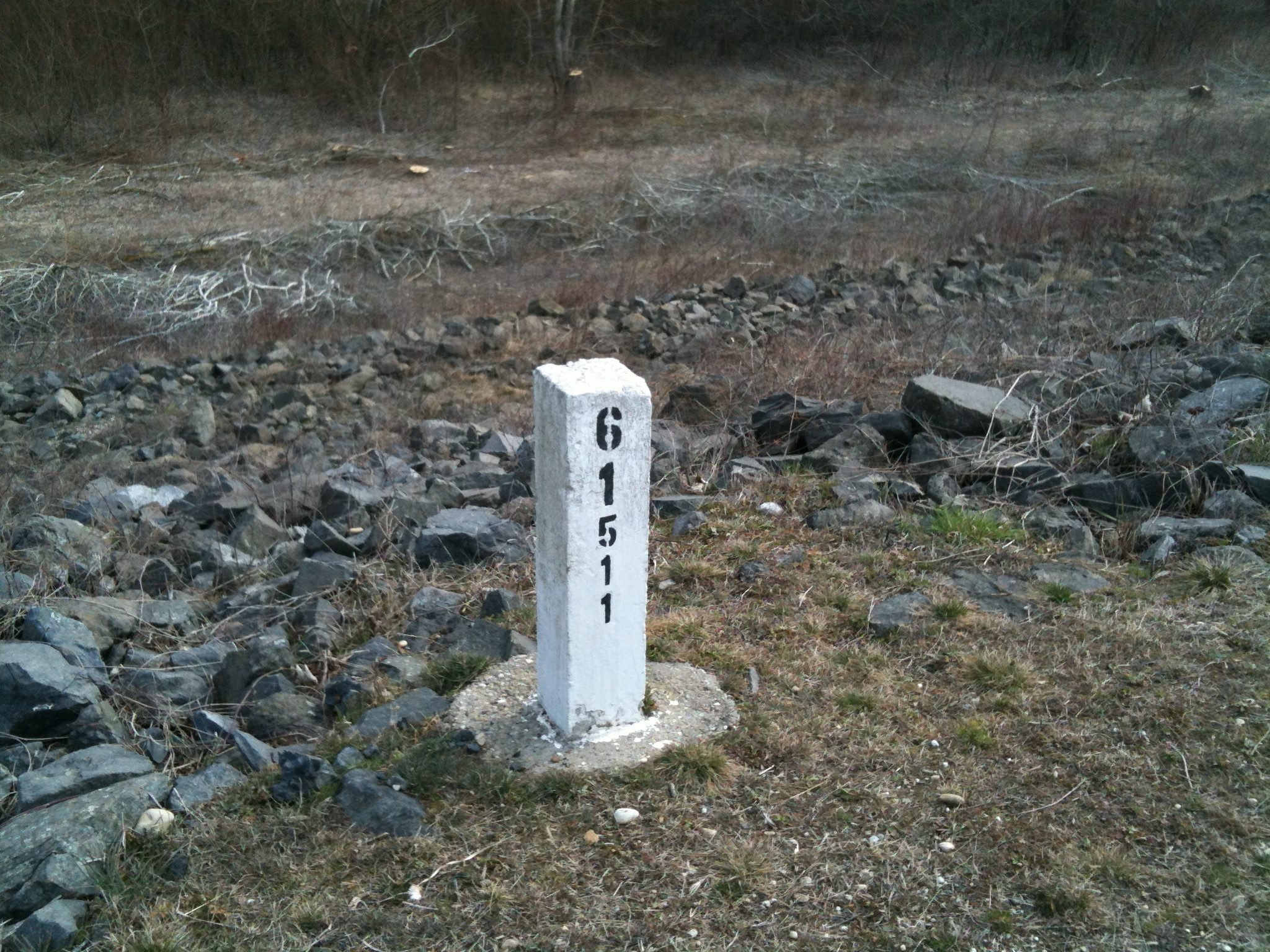 stone marker in field