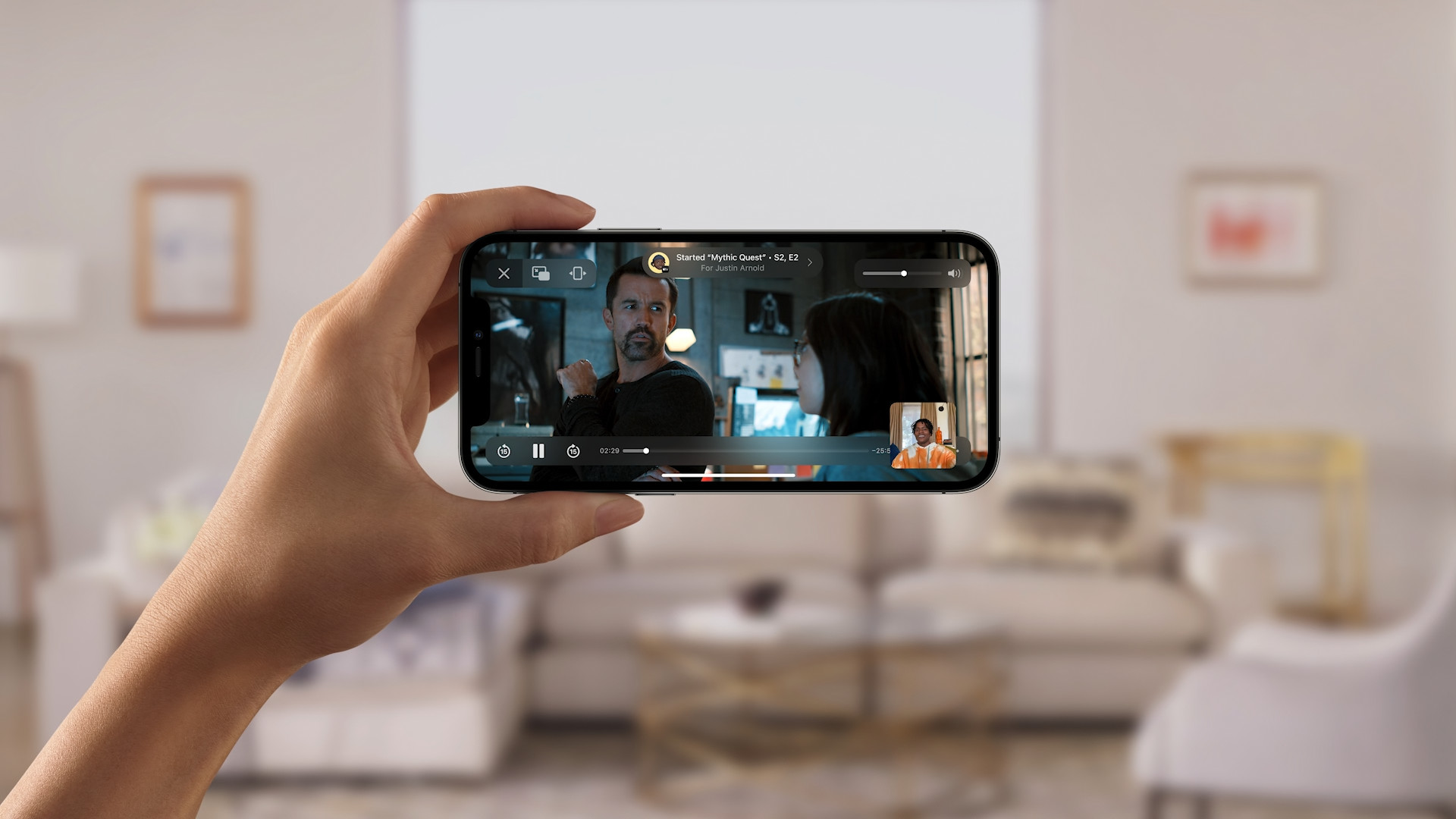 hand holding iphone video call