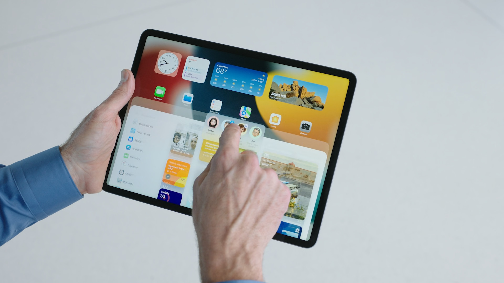 person using ipad widgets