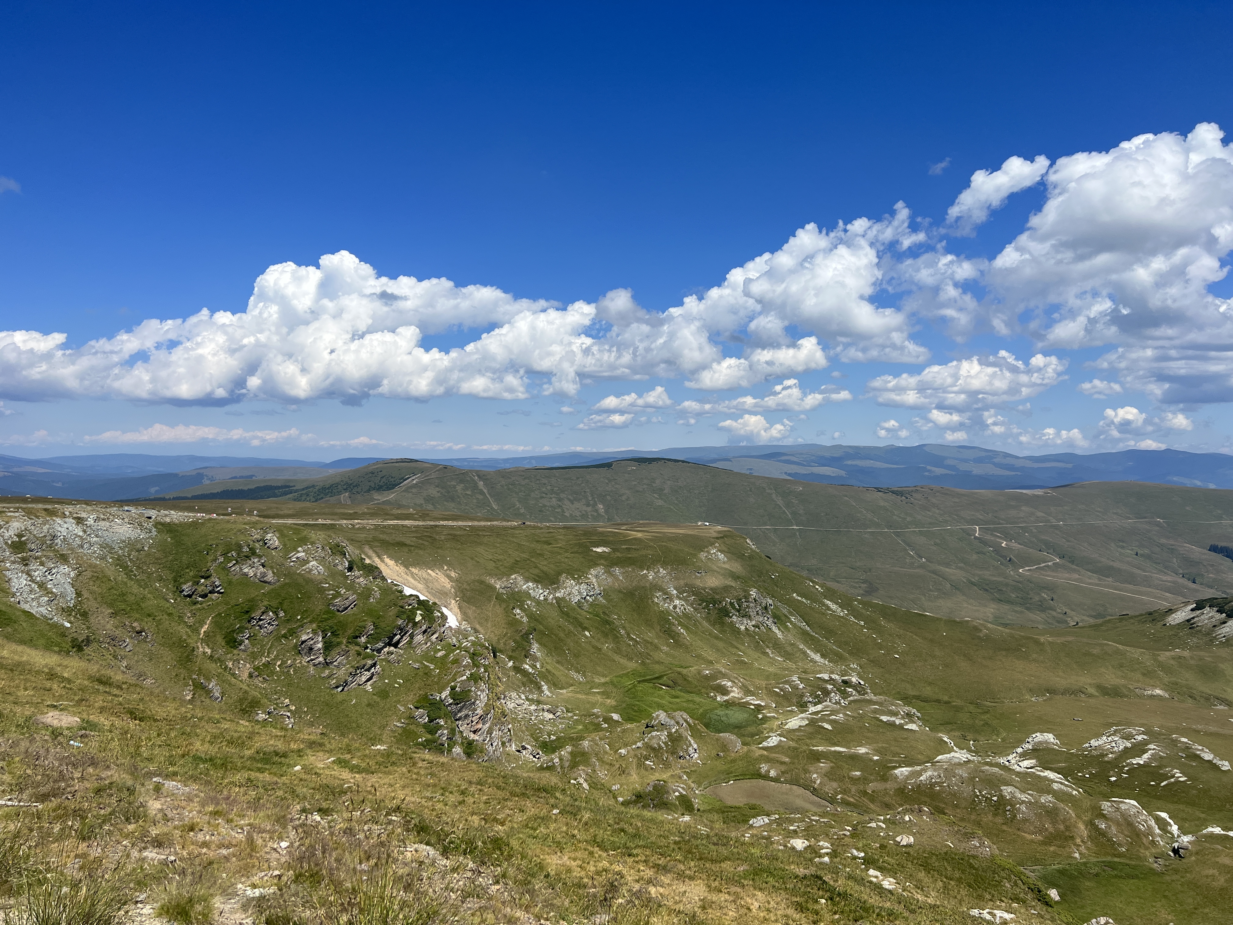 rolling hills cloudy sky