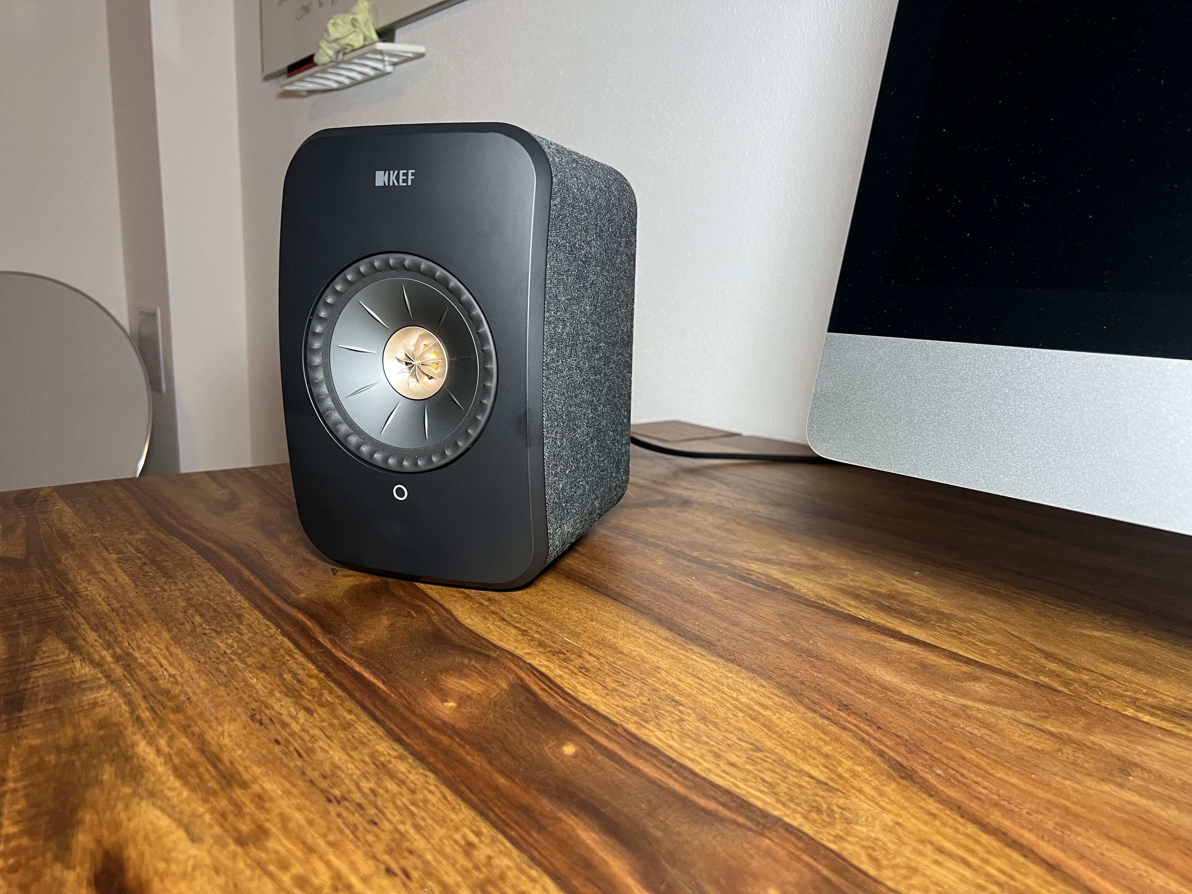 desktop speaker on wooden table