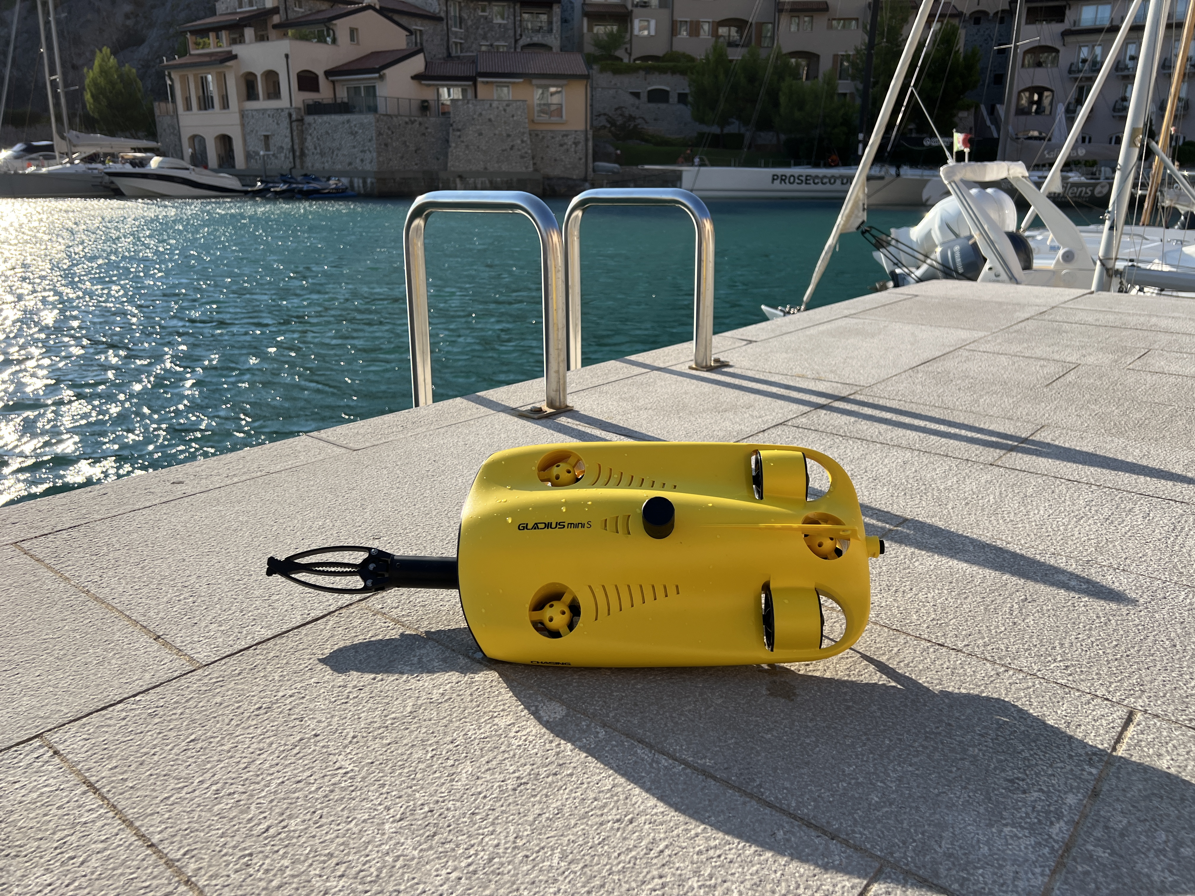 drone on dock with water view