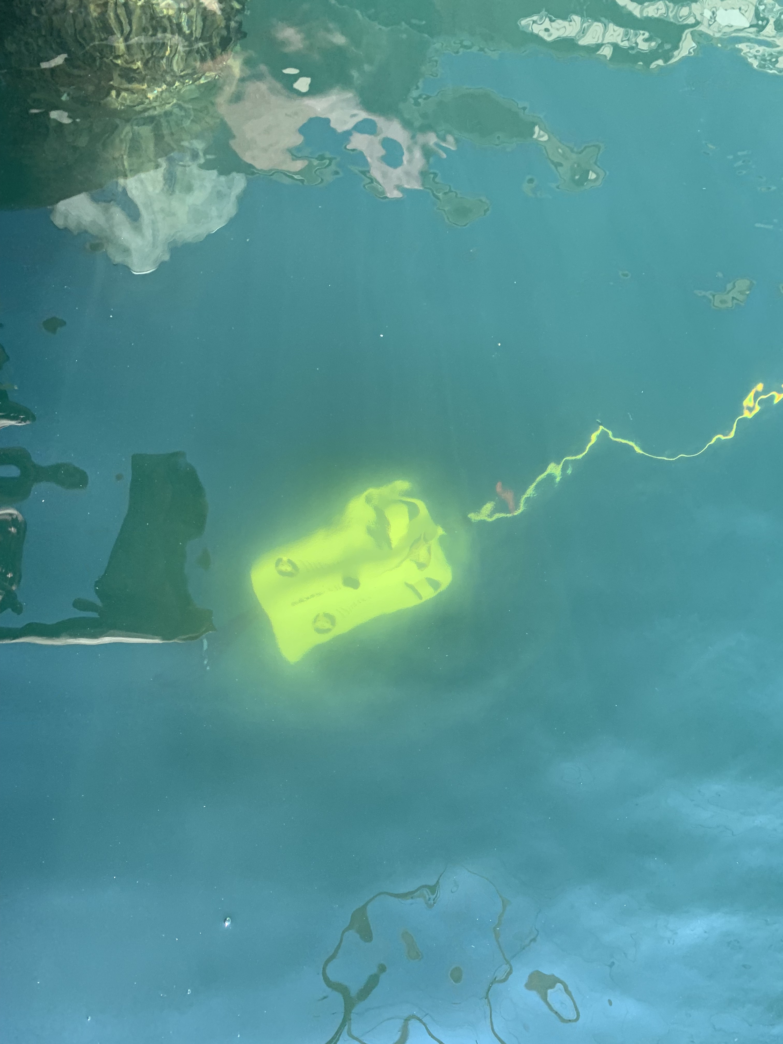 drone submerged in clear water