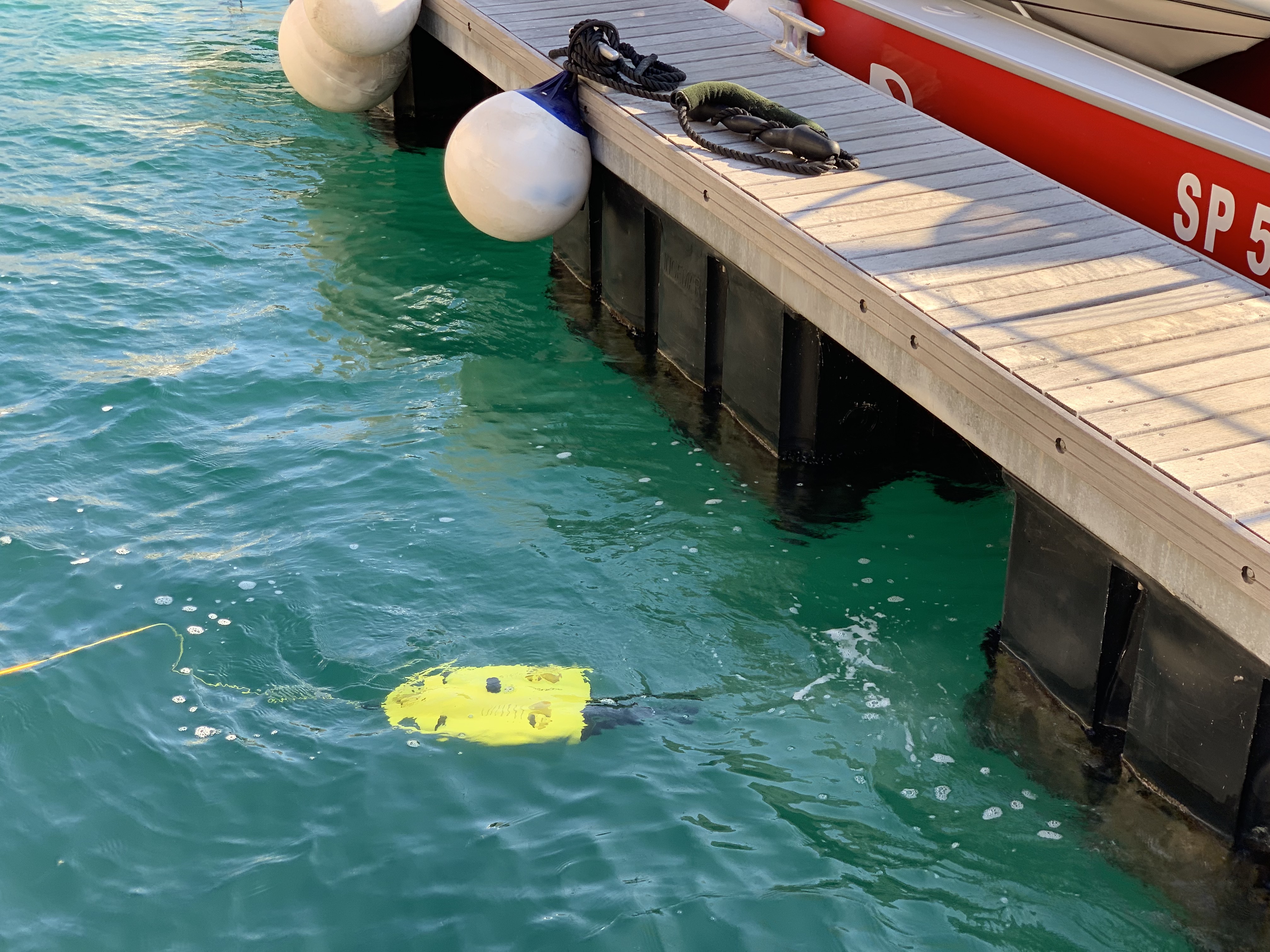 drone underwater near dock