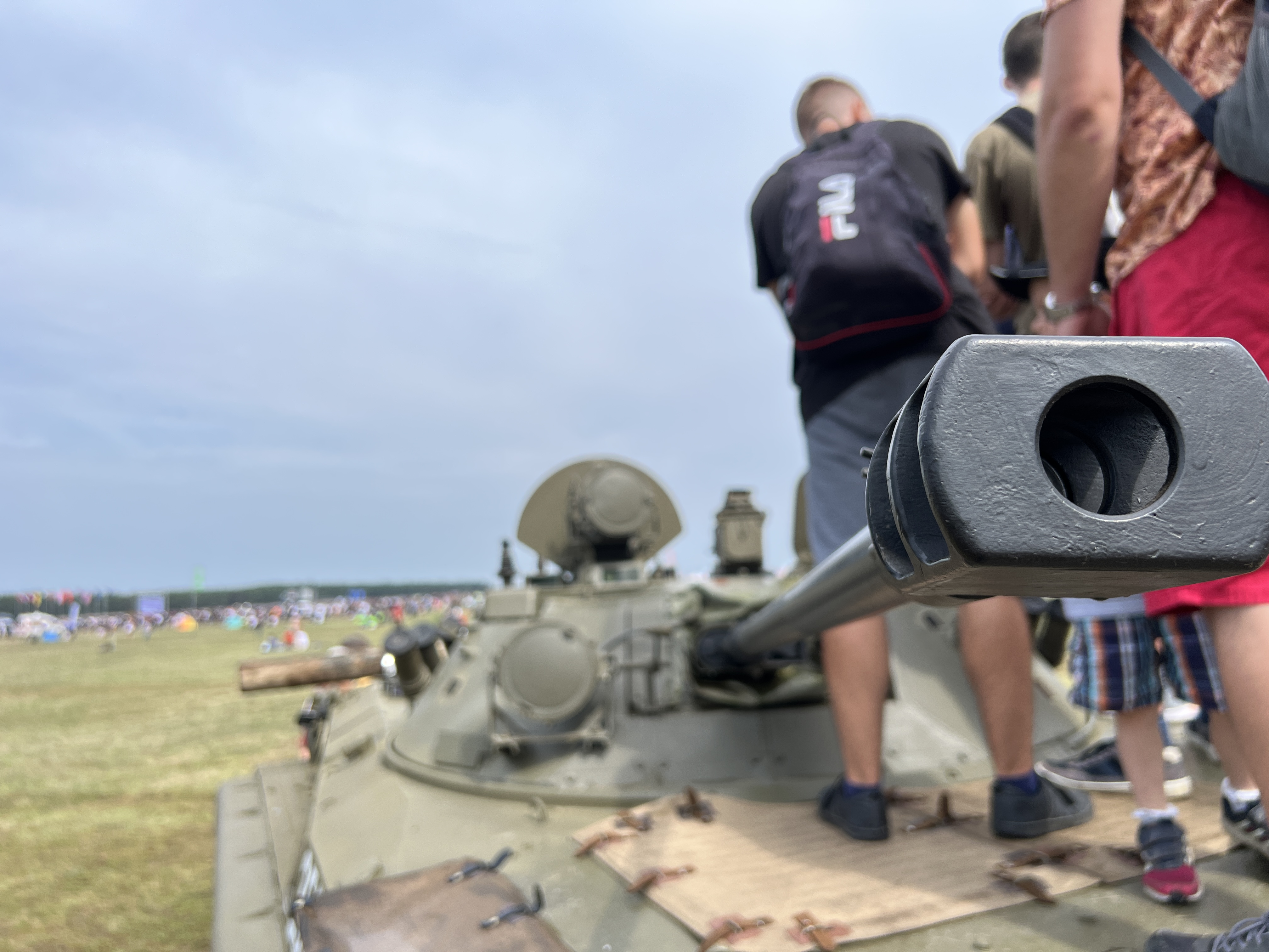 people on tank turret