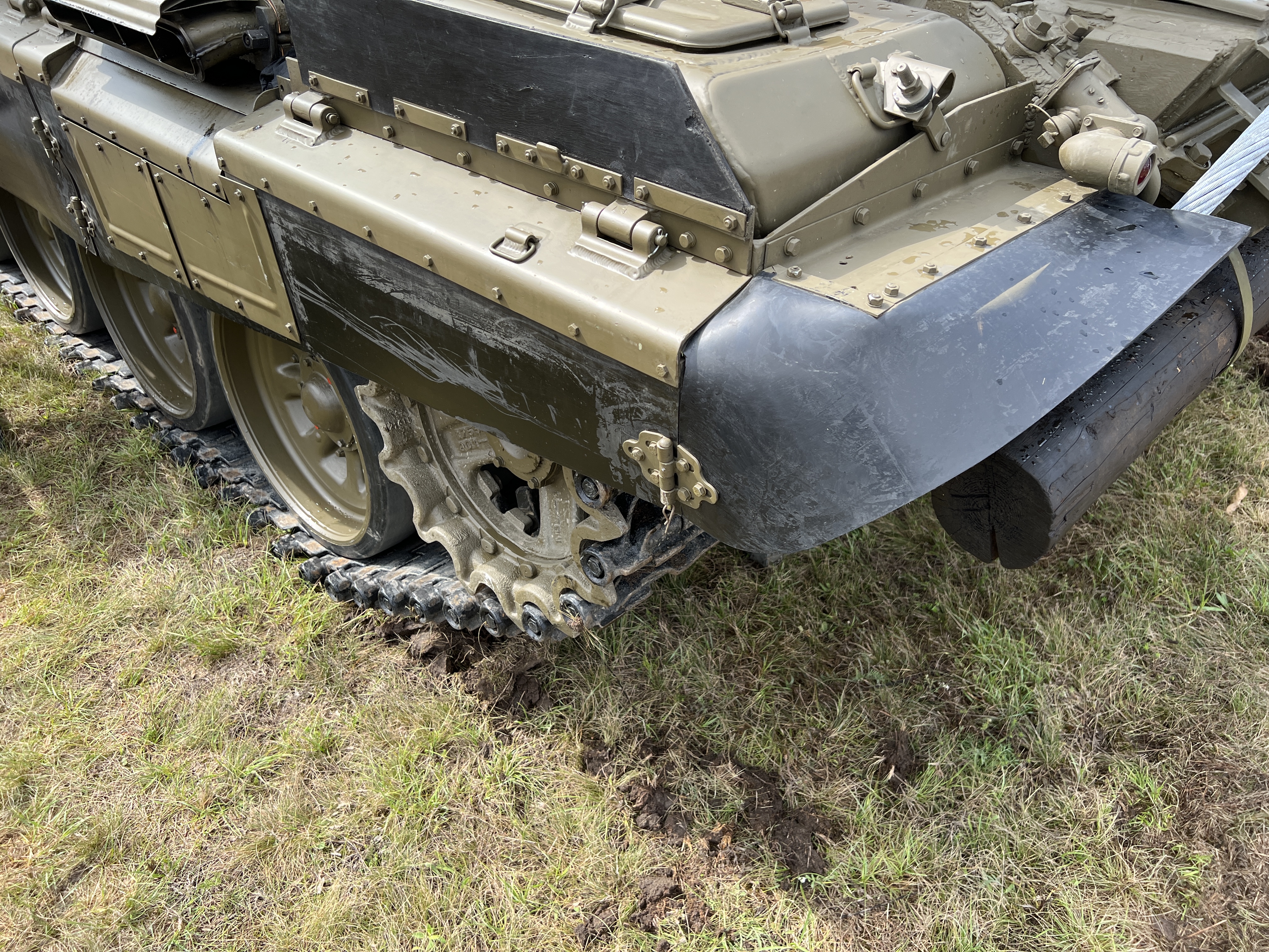tank tracks on grass