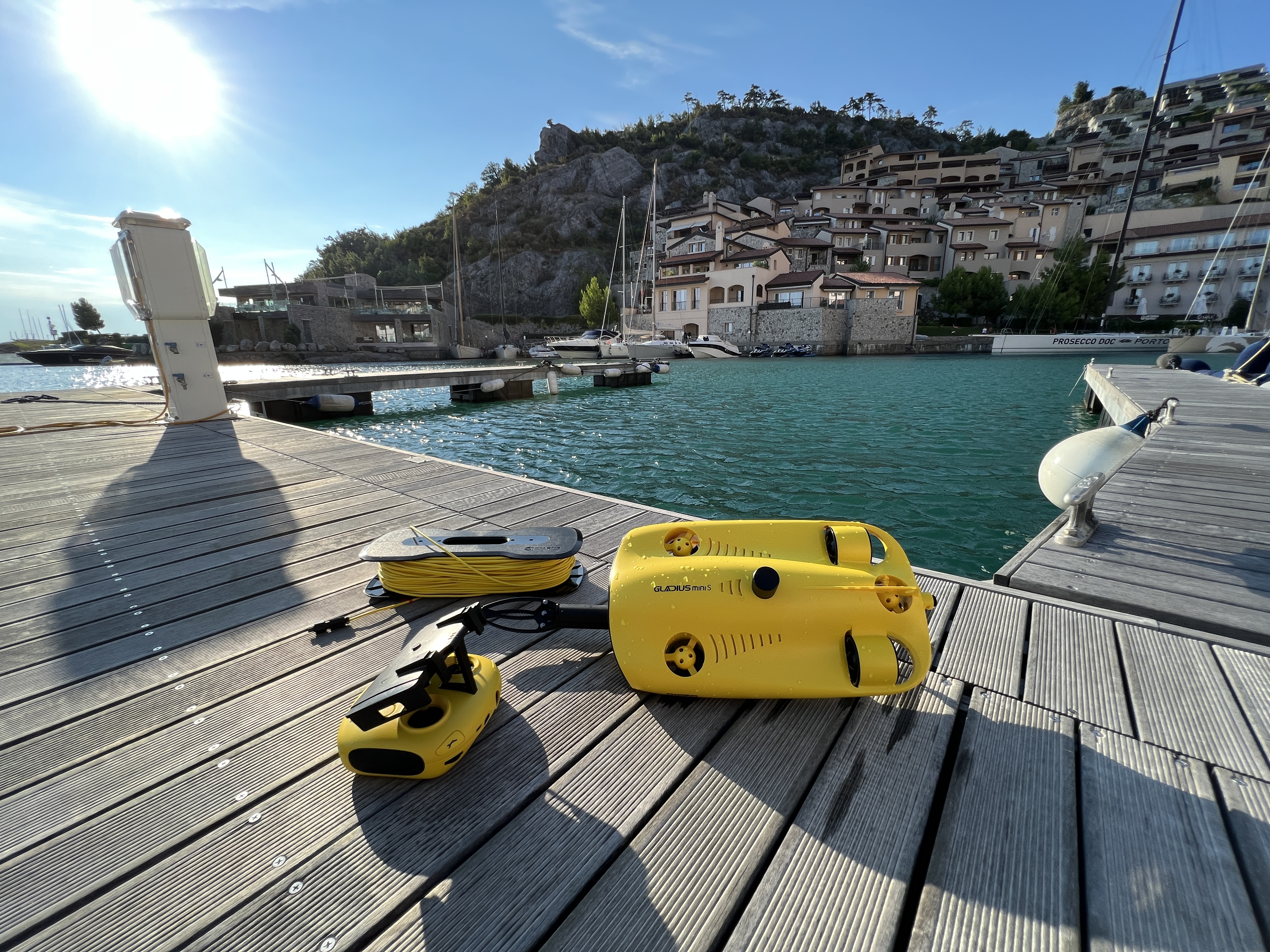 underwater drone and cable by water
