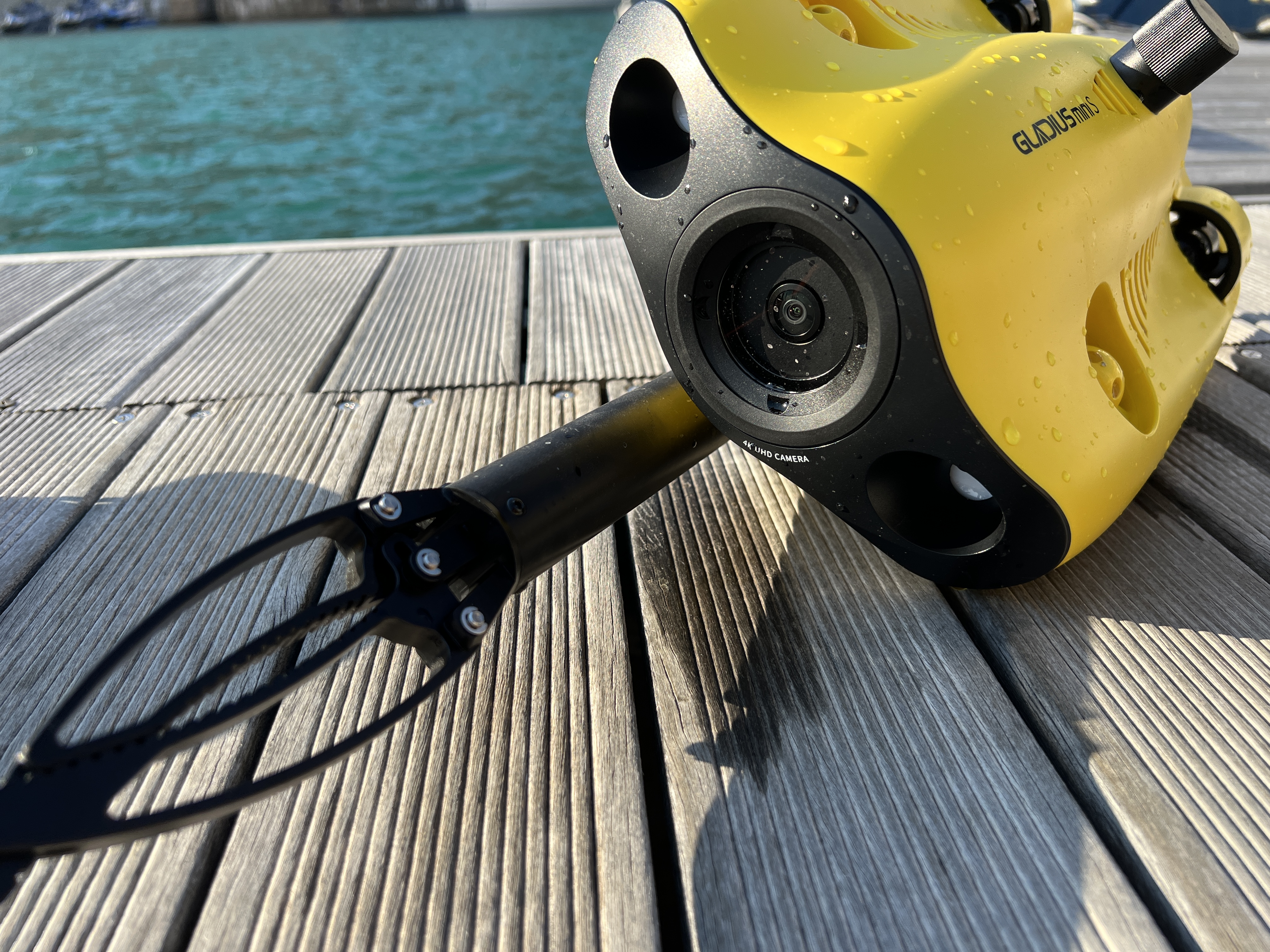 yellow underwater drone on dock