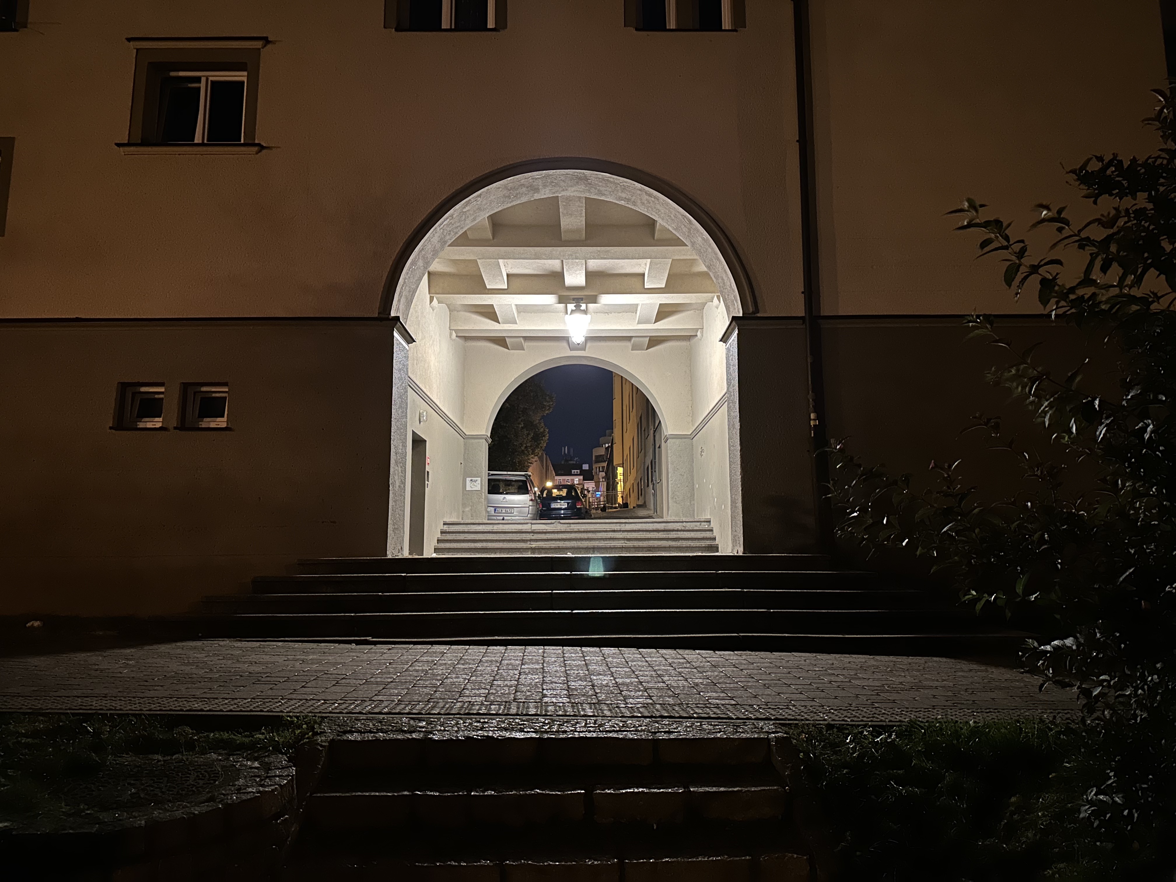 arched building entrance night