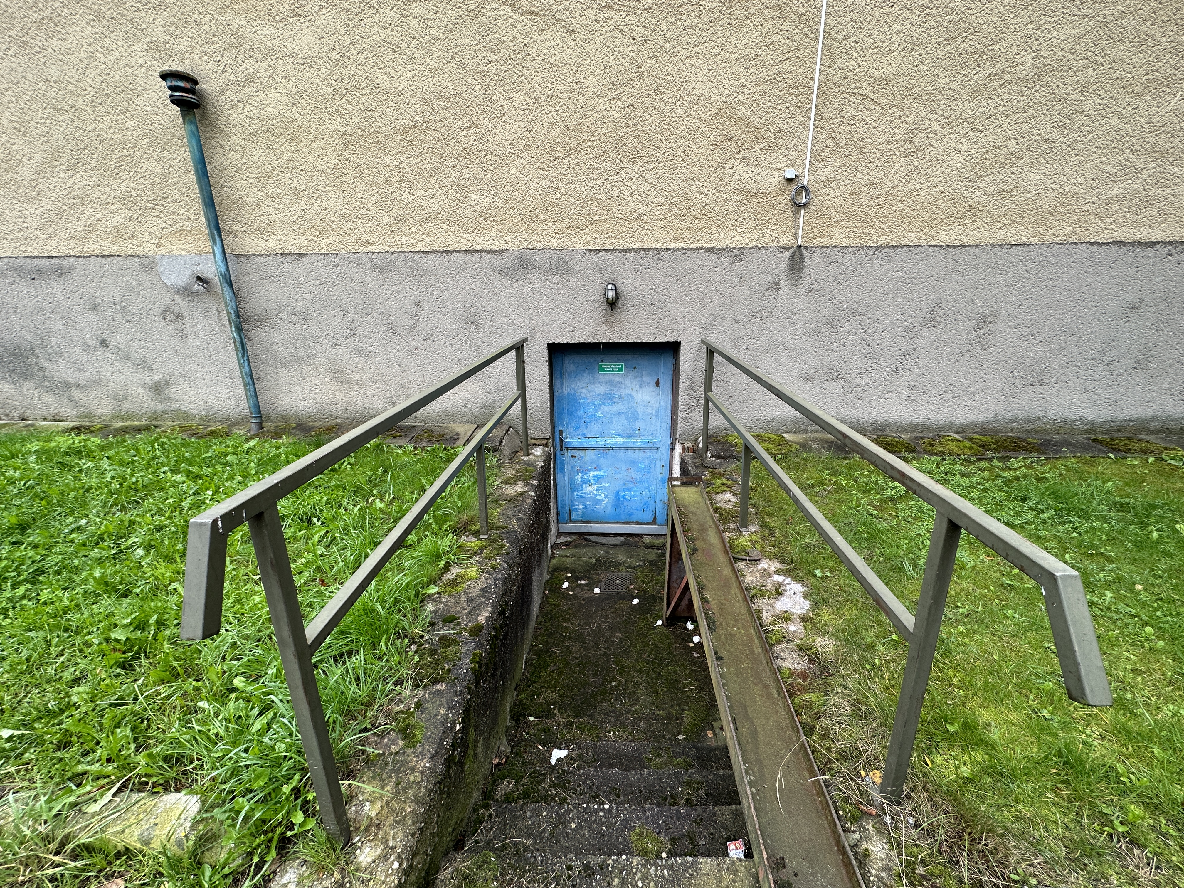 blue door basement entrance