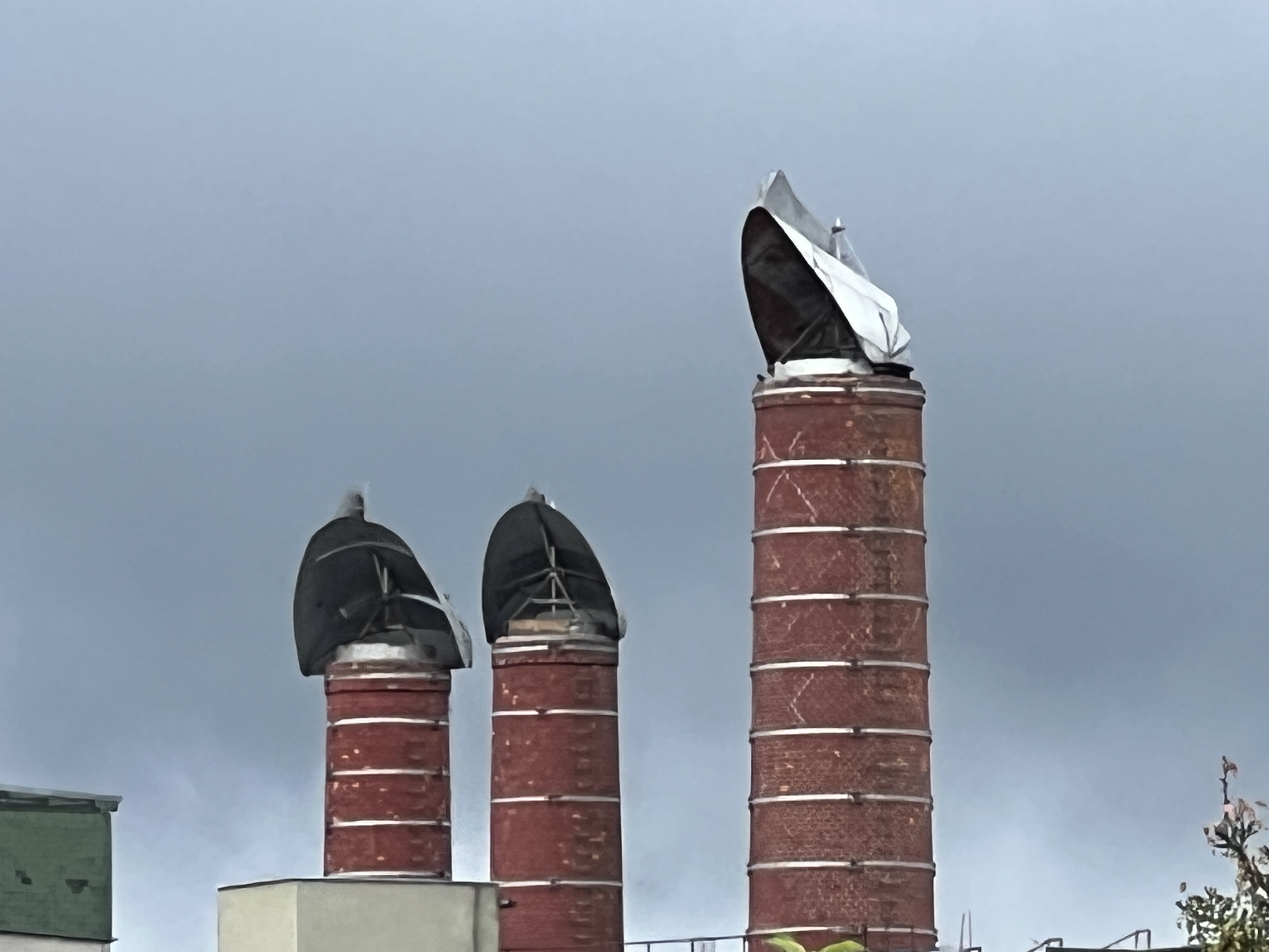 closeup of three chimneys