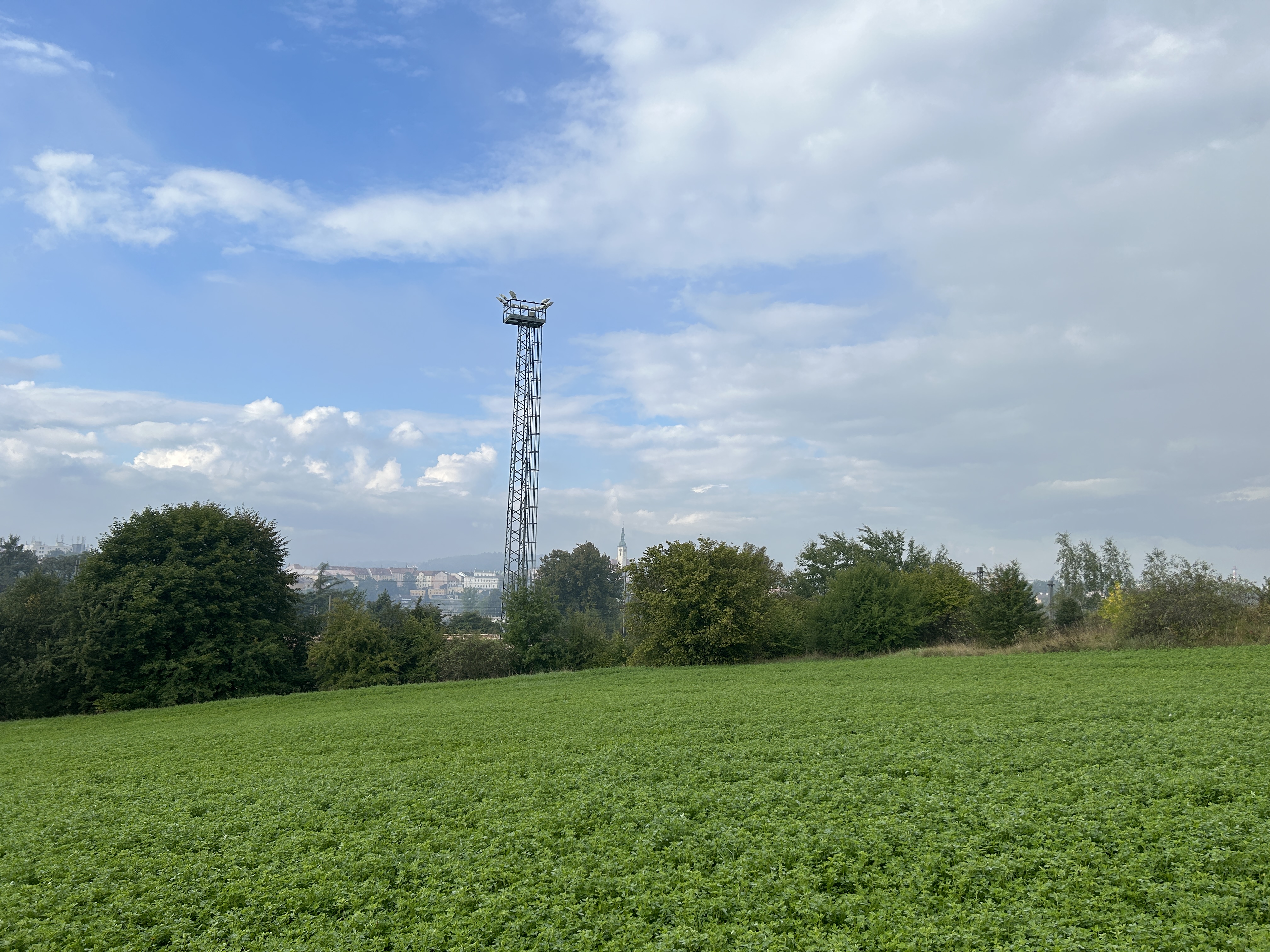 field tower clouds