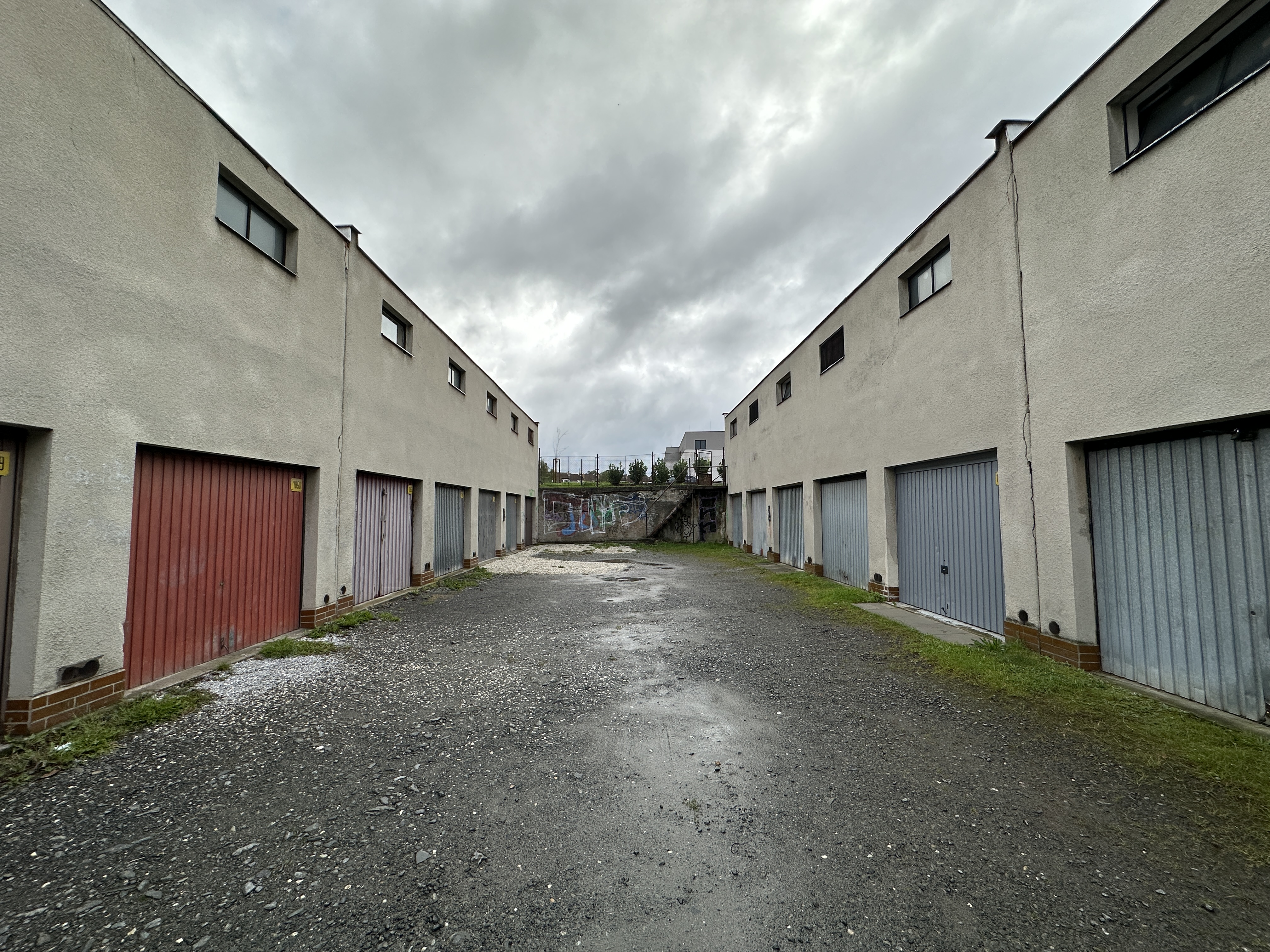 garage alley cloudy sky