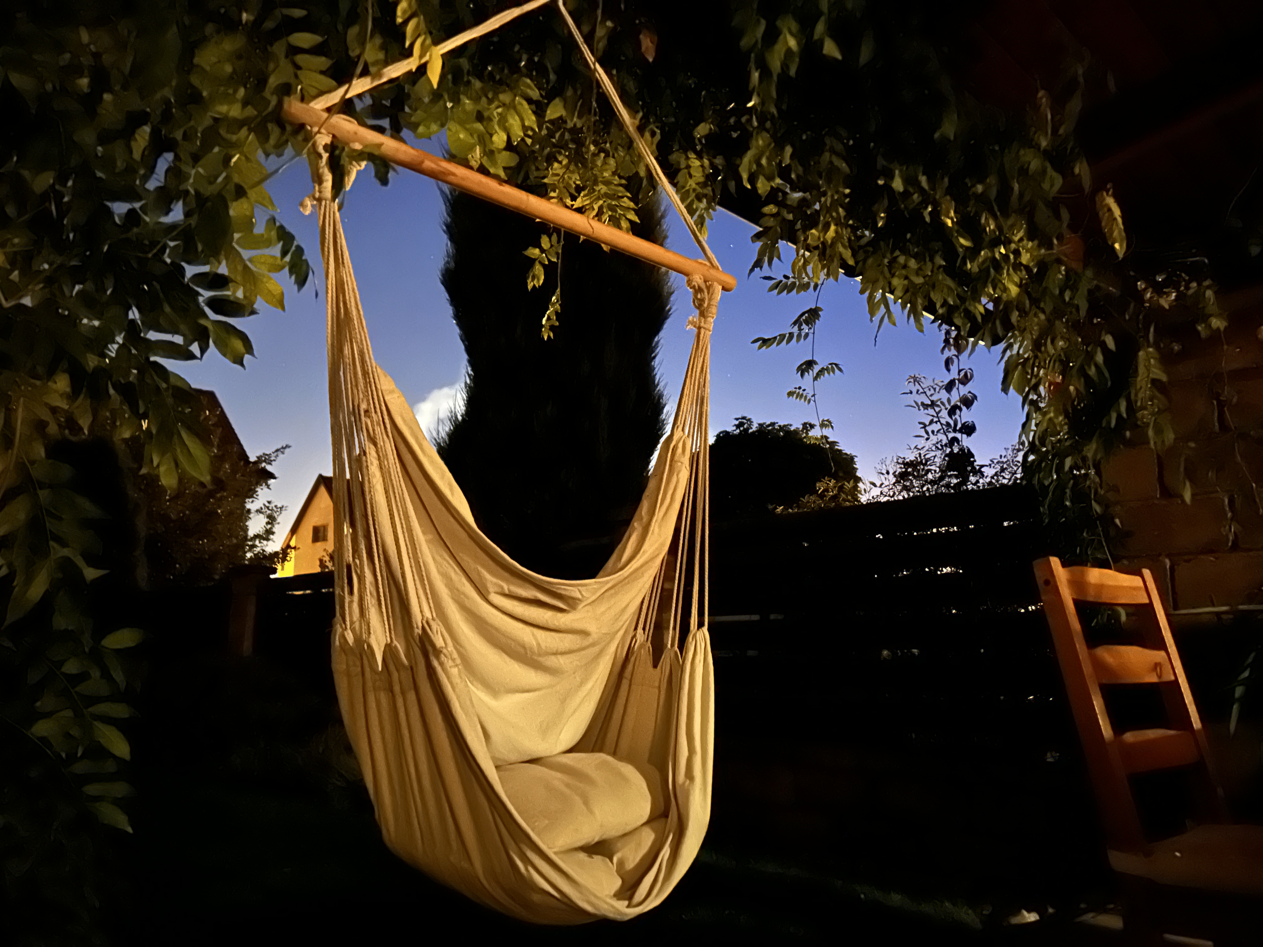 hammock chair in garden at night