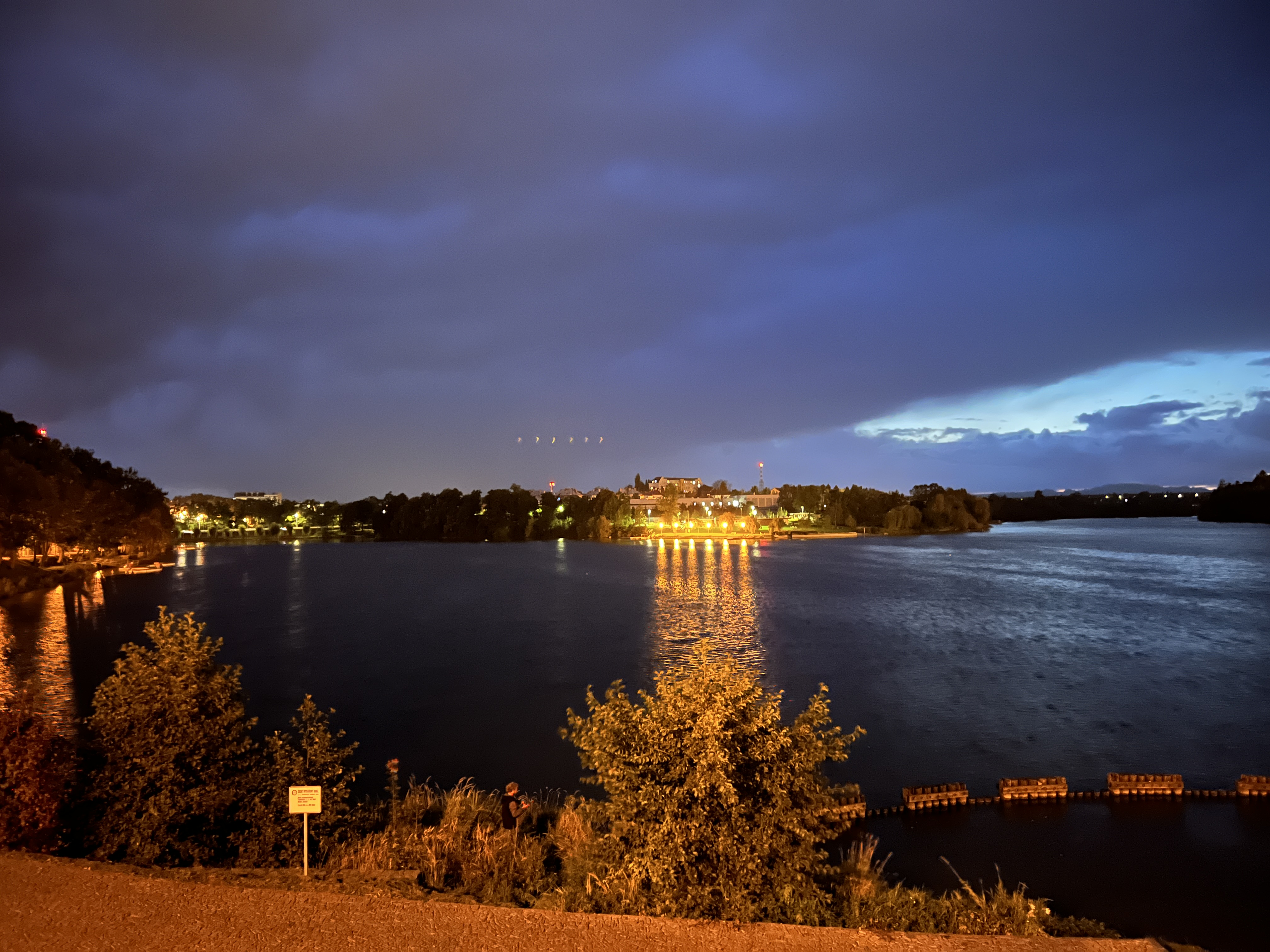 illuminated lakefront at night