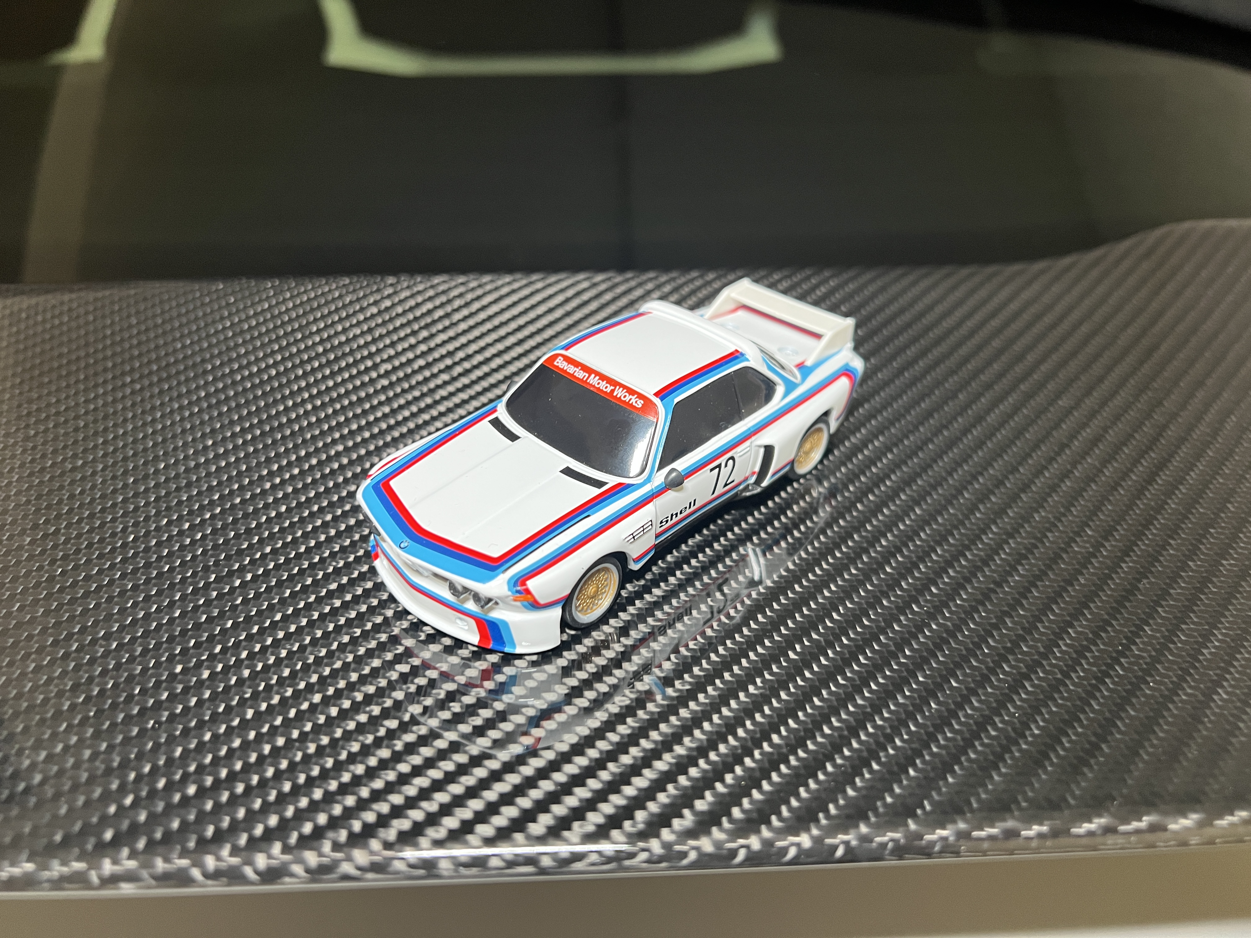 miniature car on carbon fiber surface