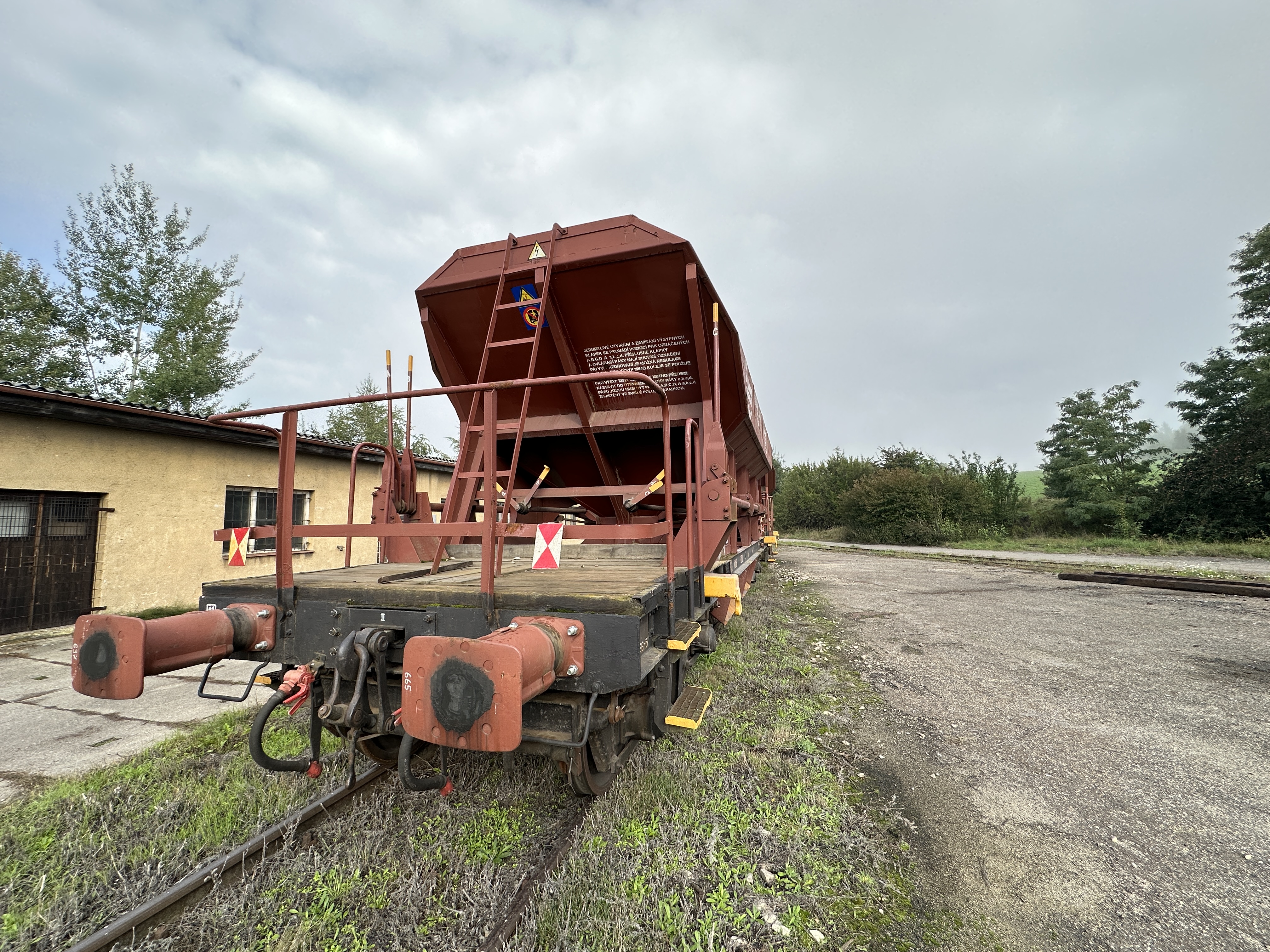 red freight train car closeup