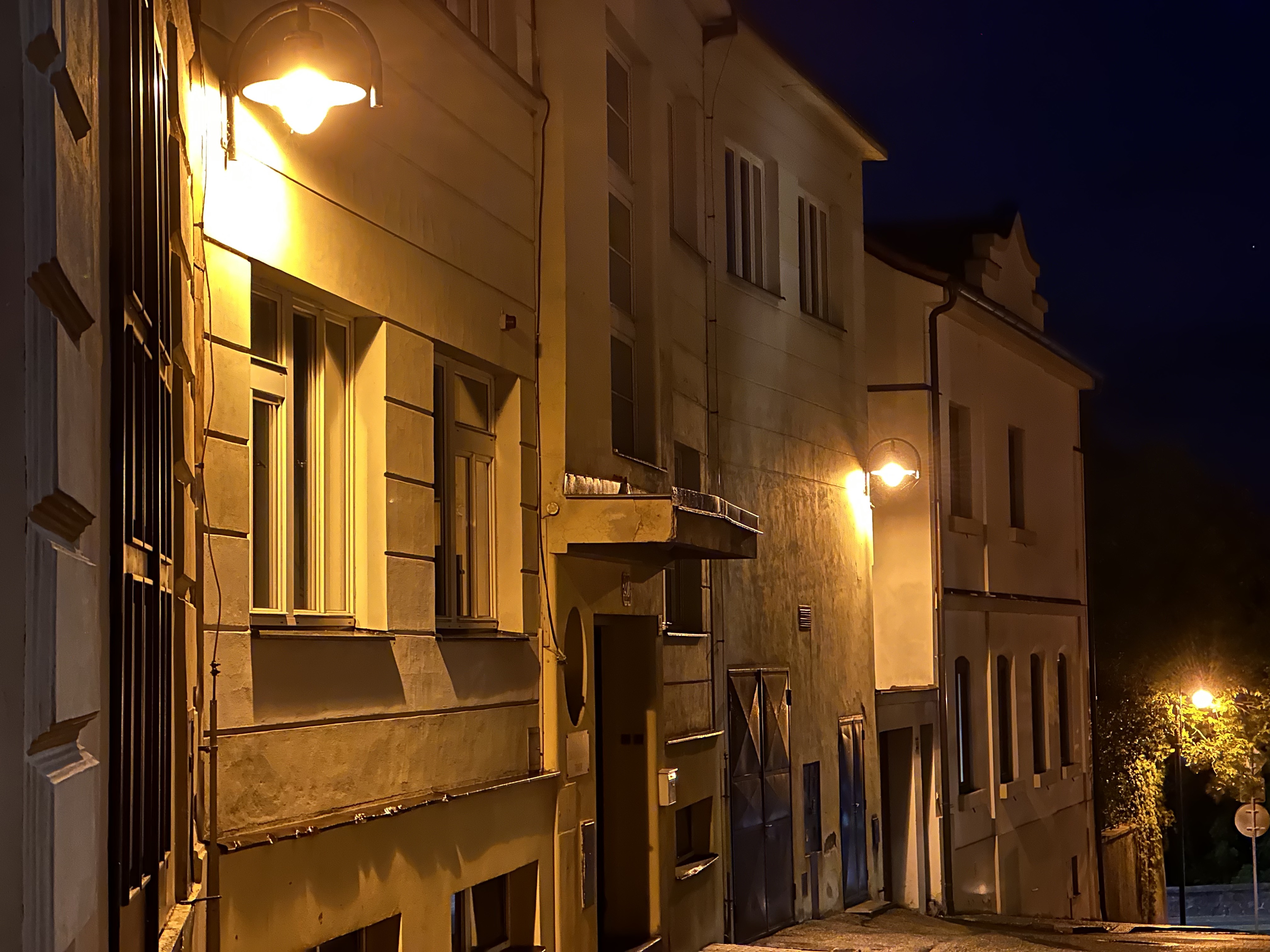 street lamp lit alley