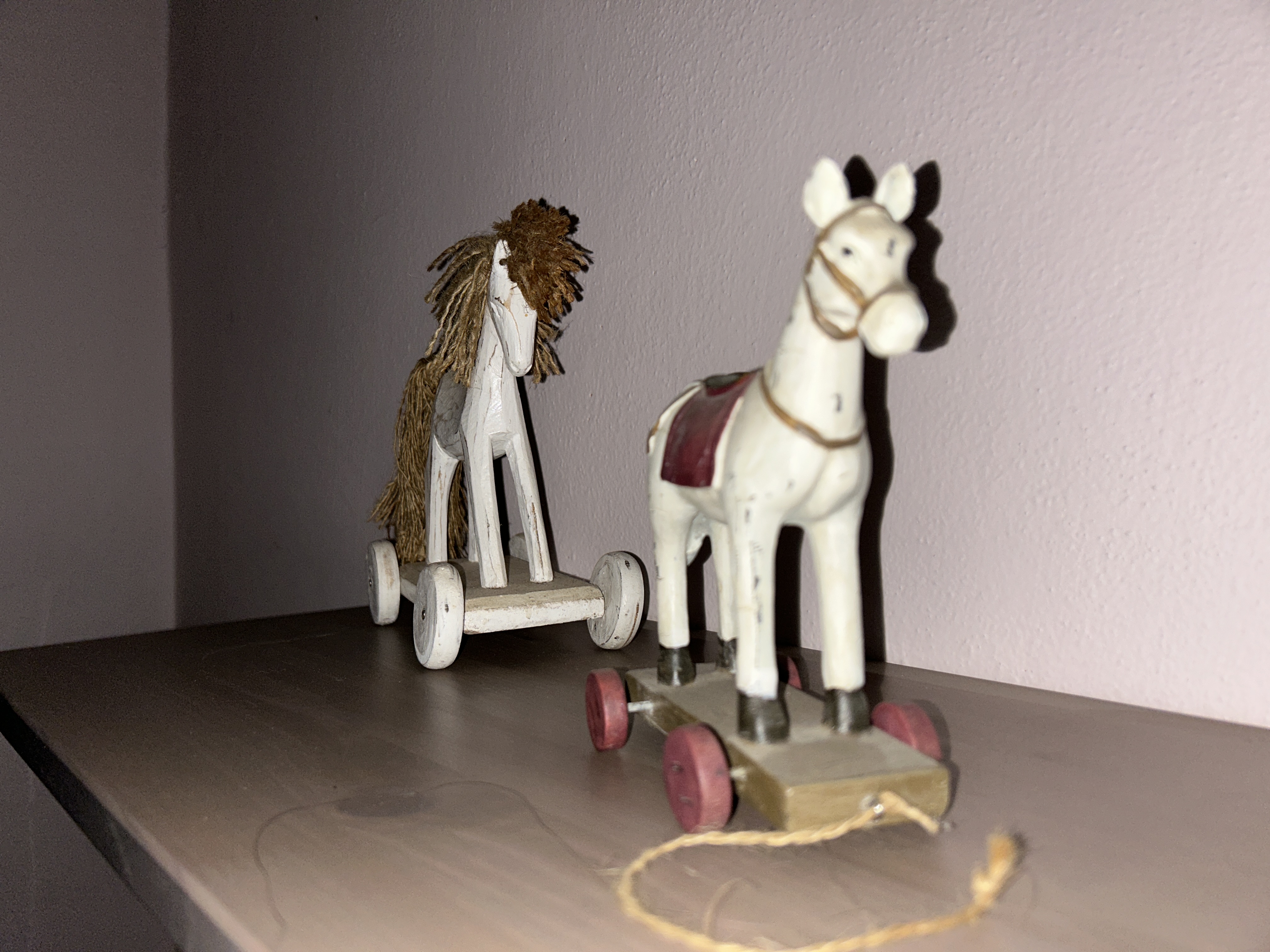 wooden toy horses bright light