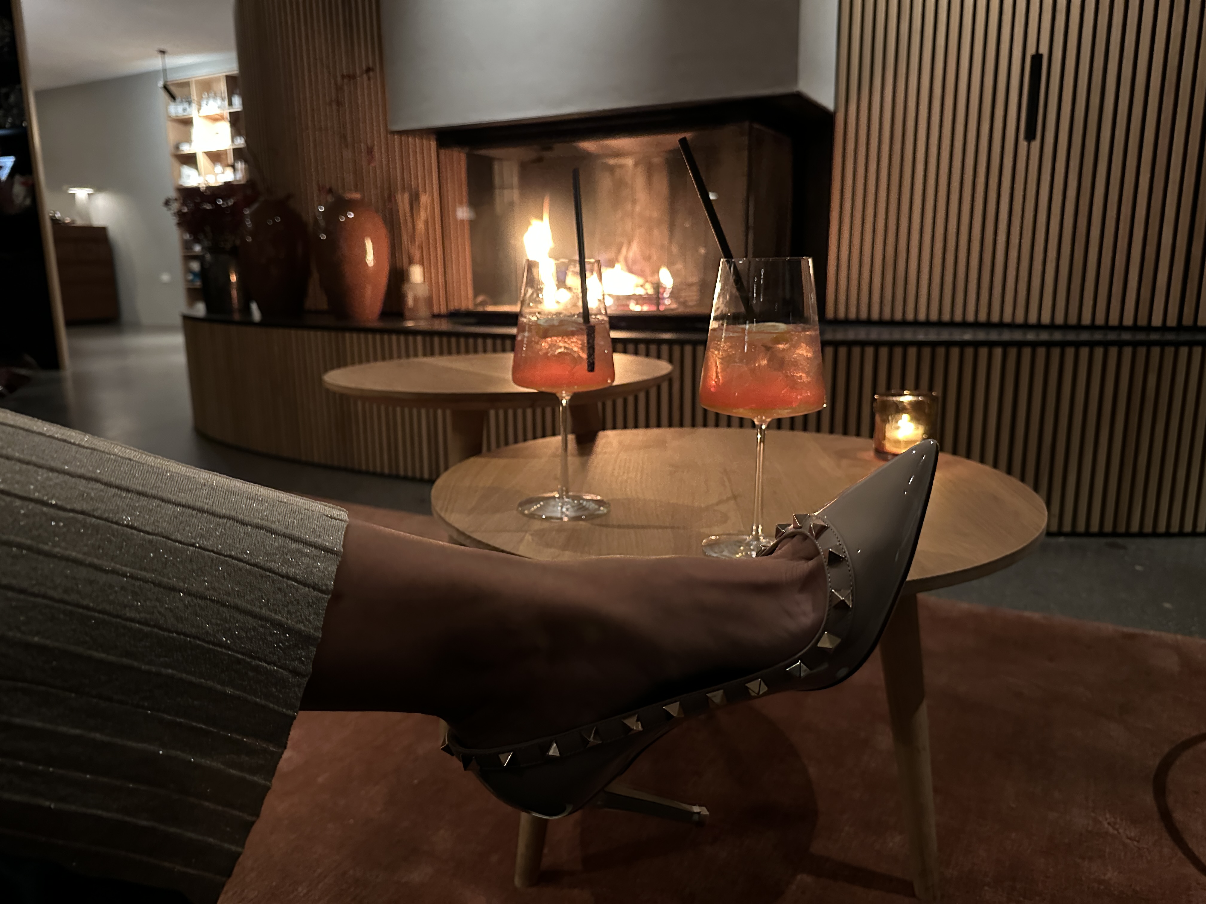 cozy fireplace with drinks
