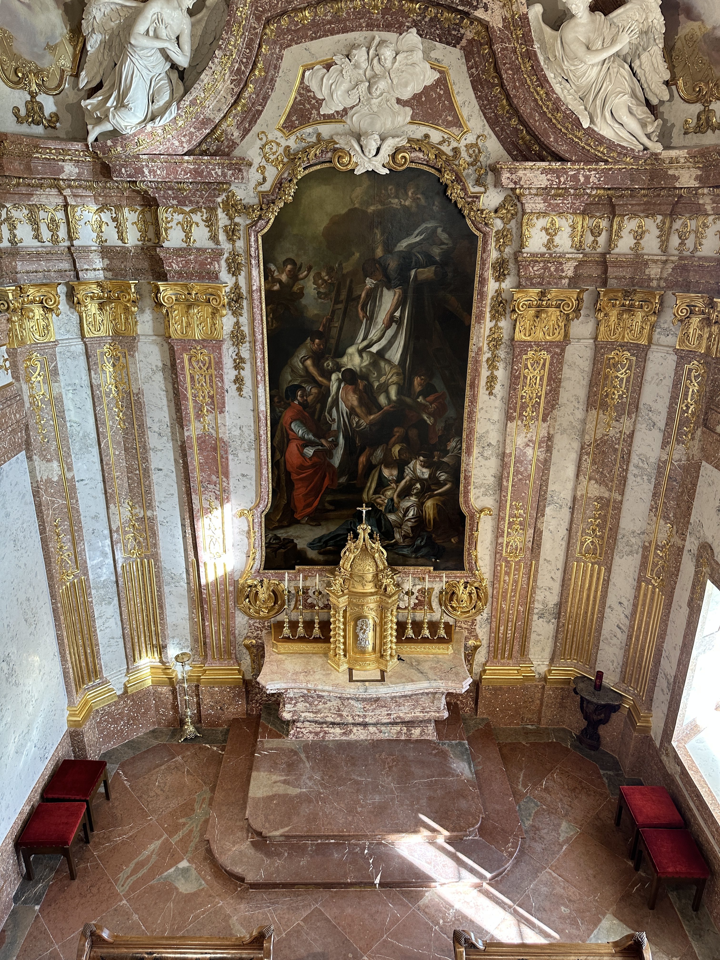 ornate church interior with painting