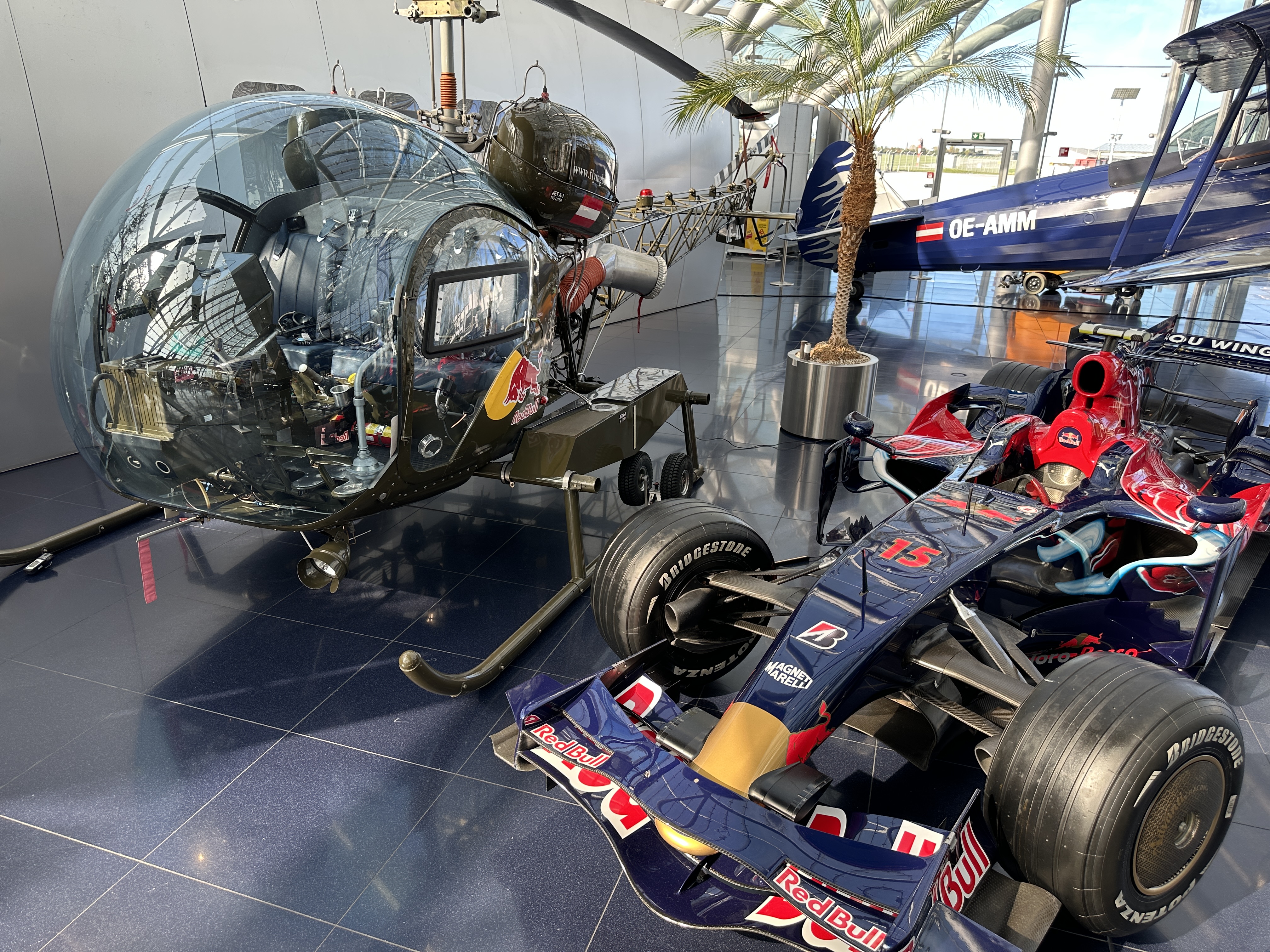 red bull helicopter and car