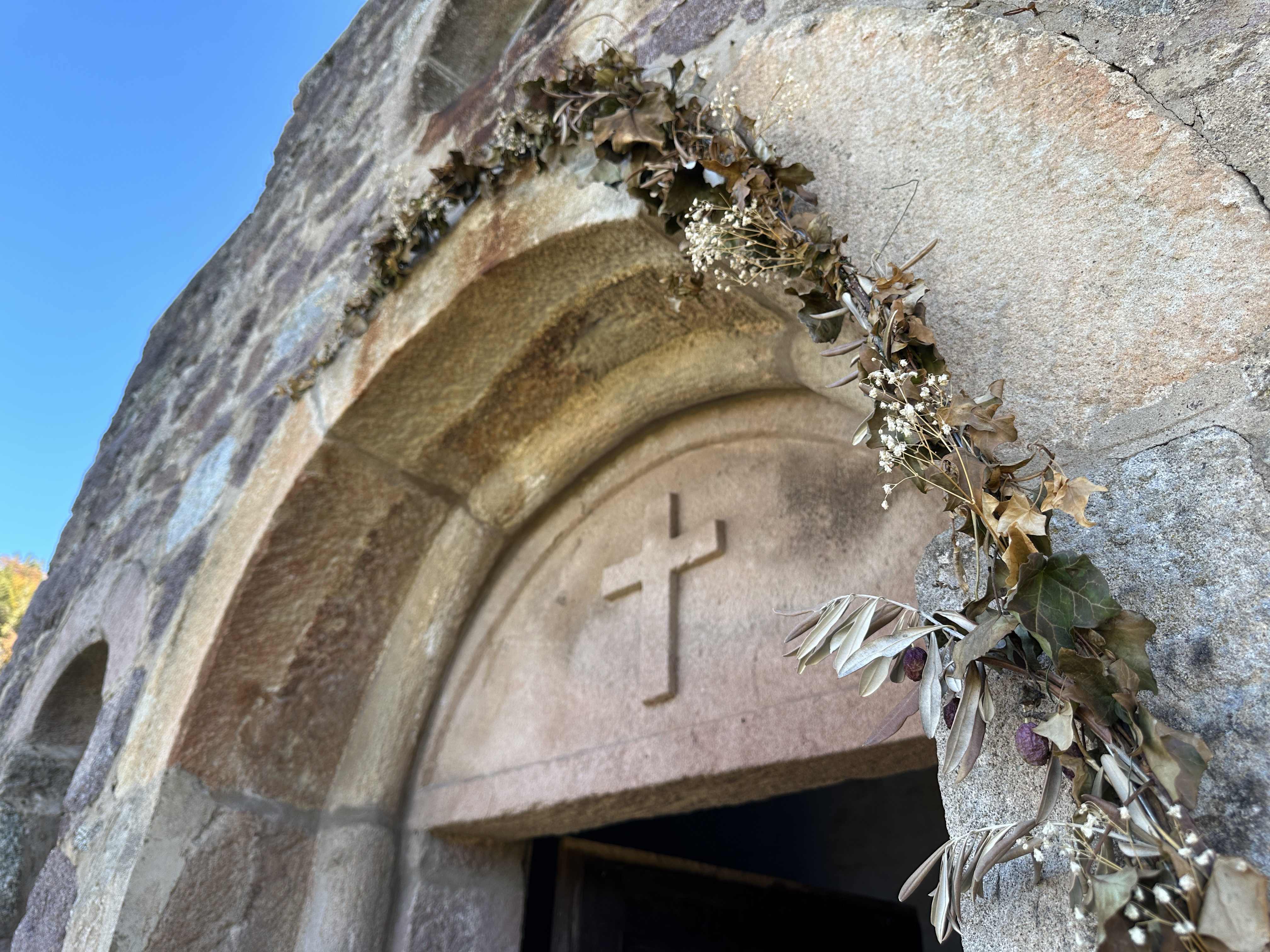 stone arch church cross