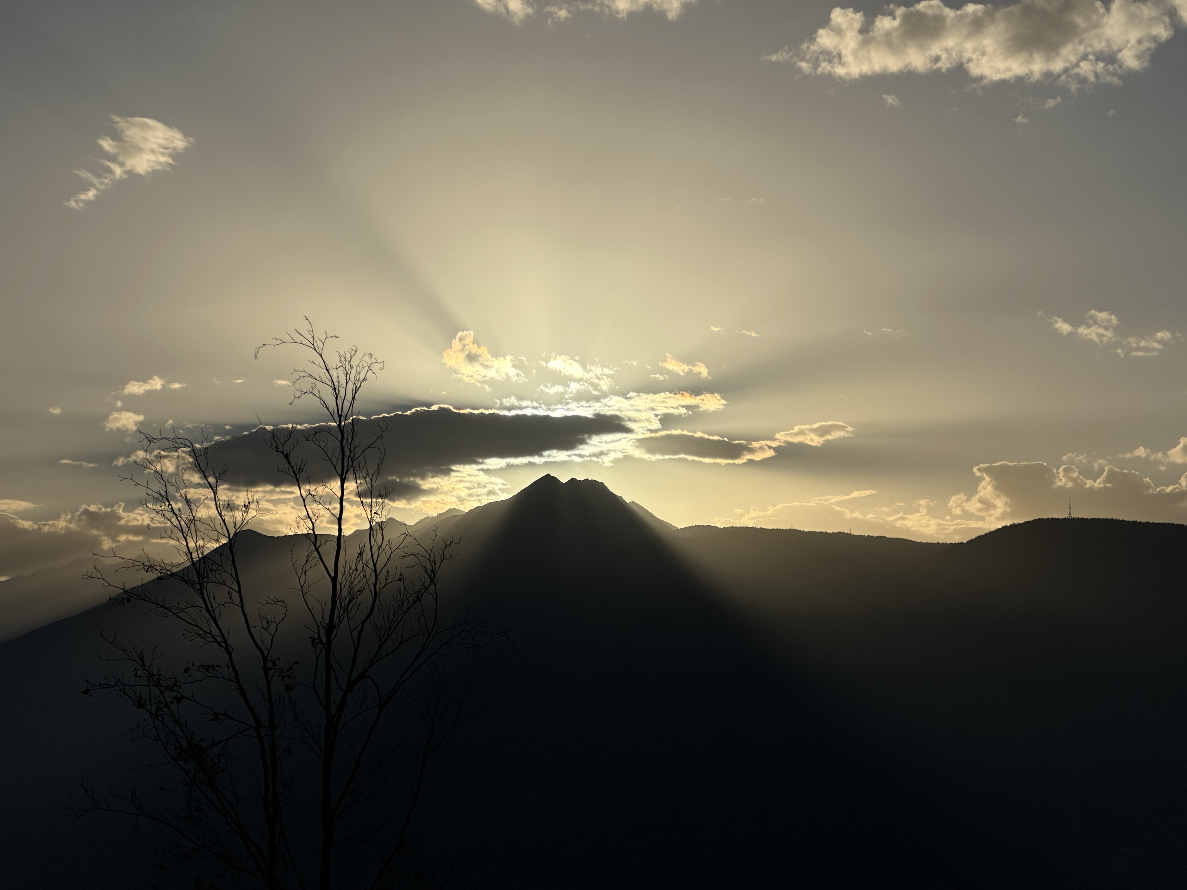 sunset behind mountain