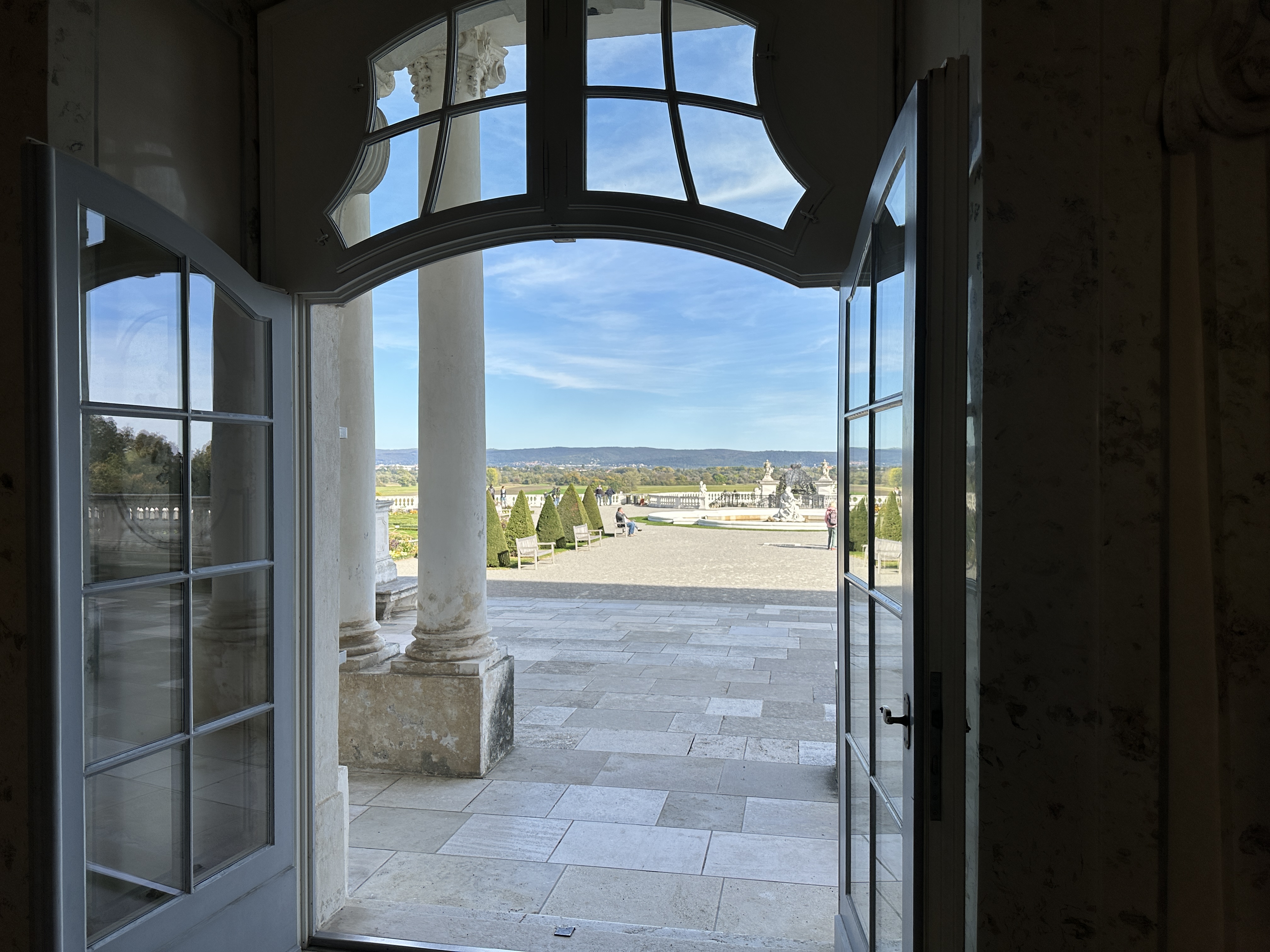 view through open doors to garden