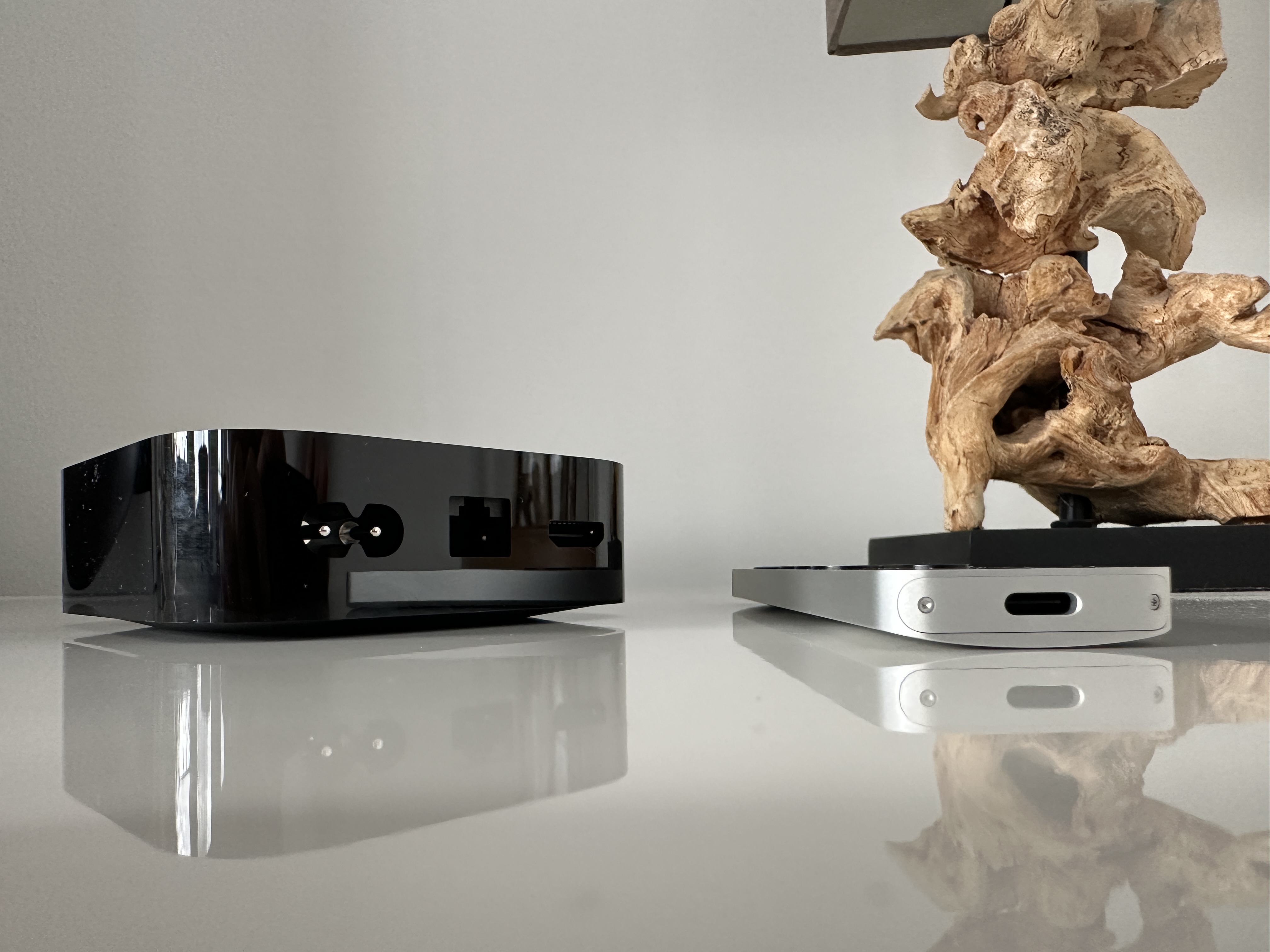 apple tv device remote wooden sculpture