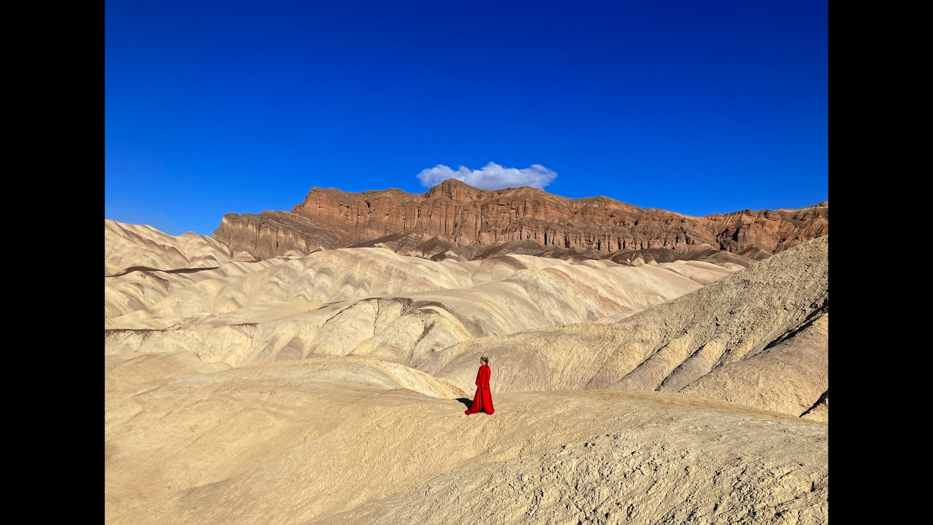 desert landscape person red