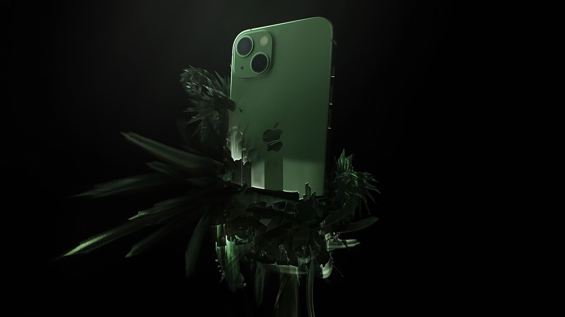 green iphone 13 with leaves