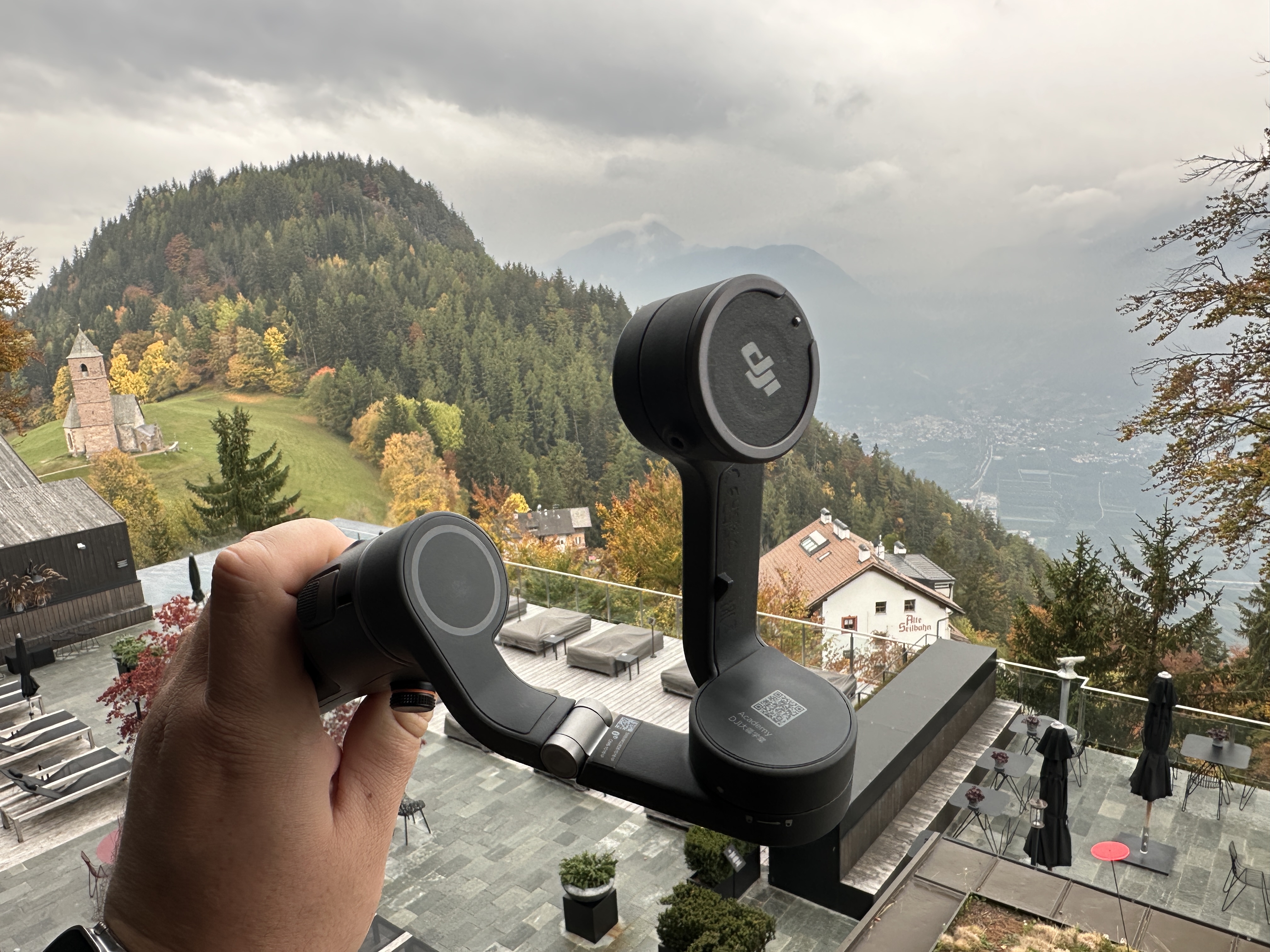 hand holding gimbal mountain view