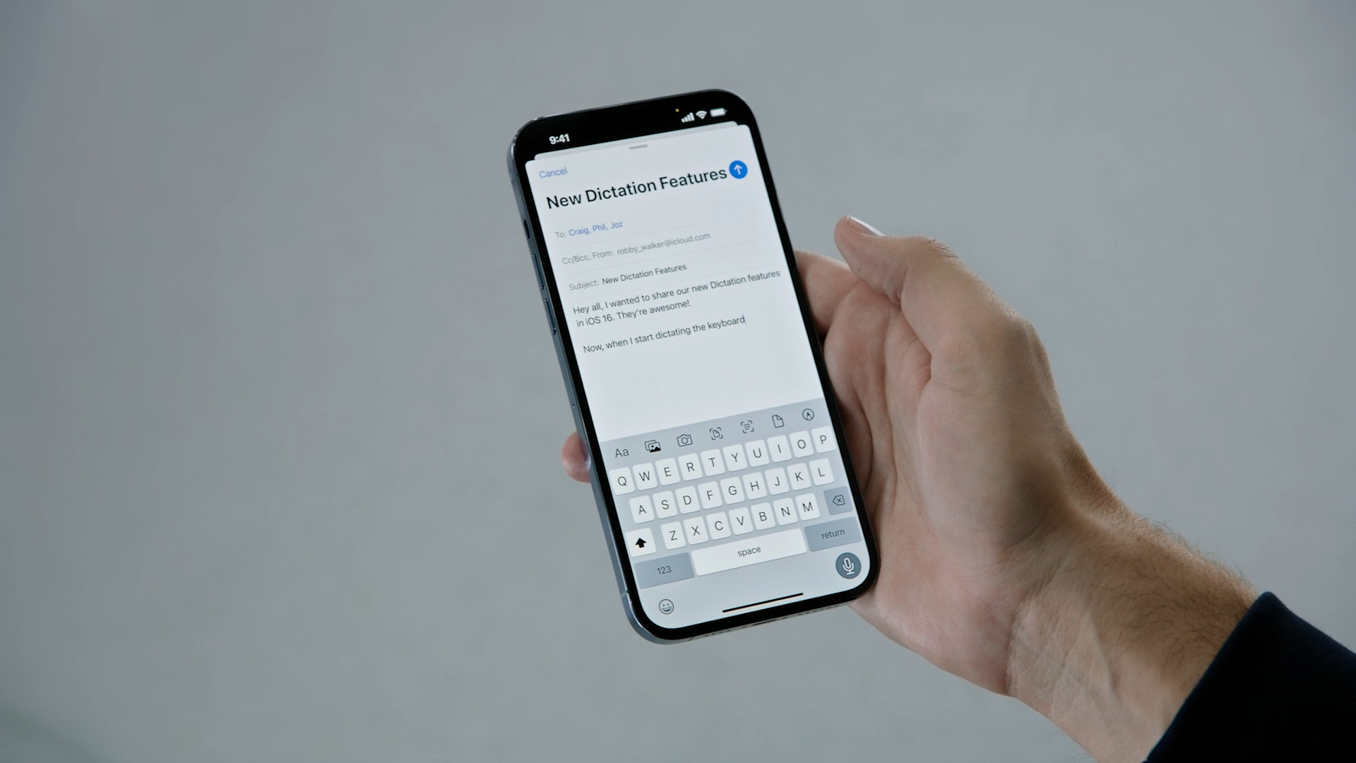 hand holding iphone dictation