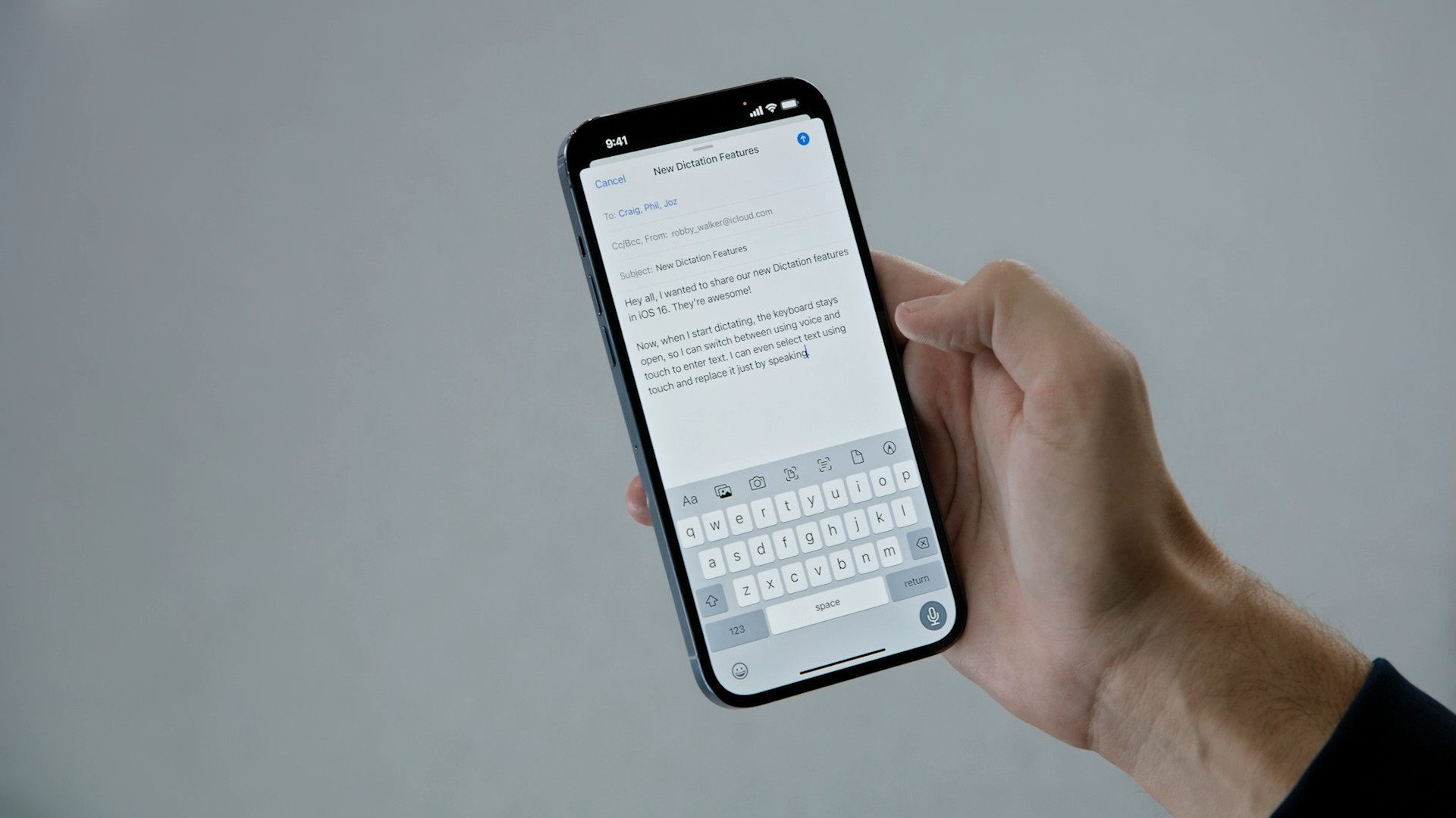hand holding smartphone email