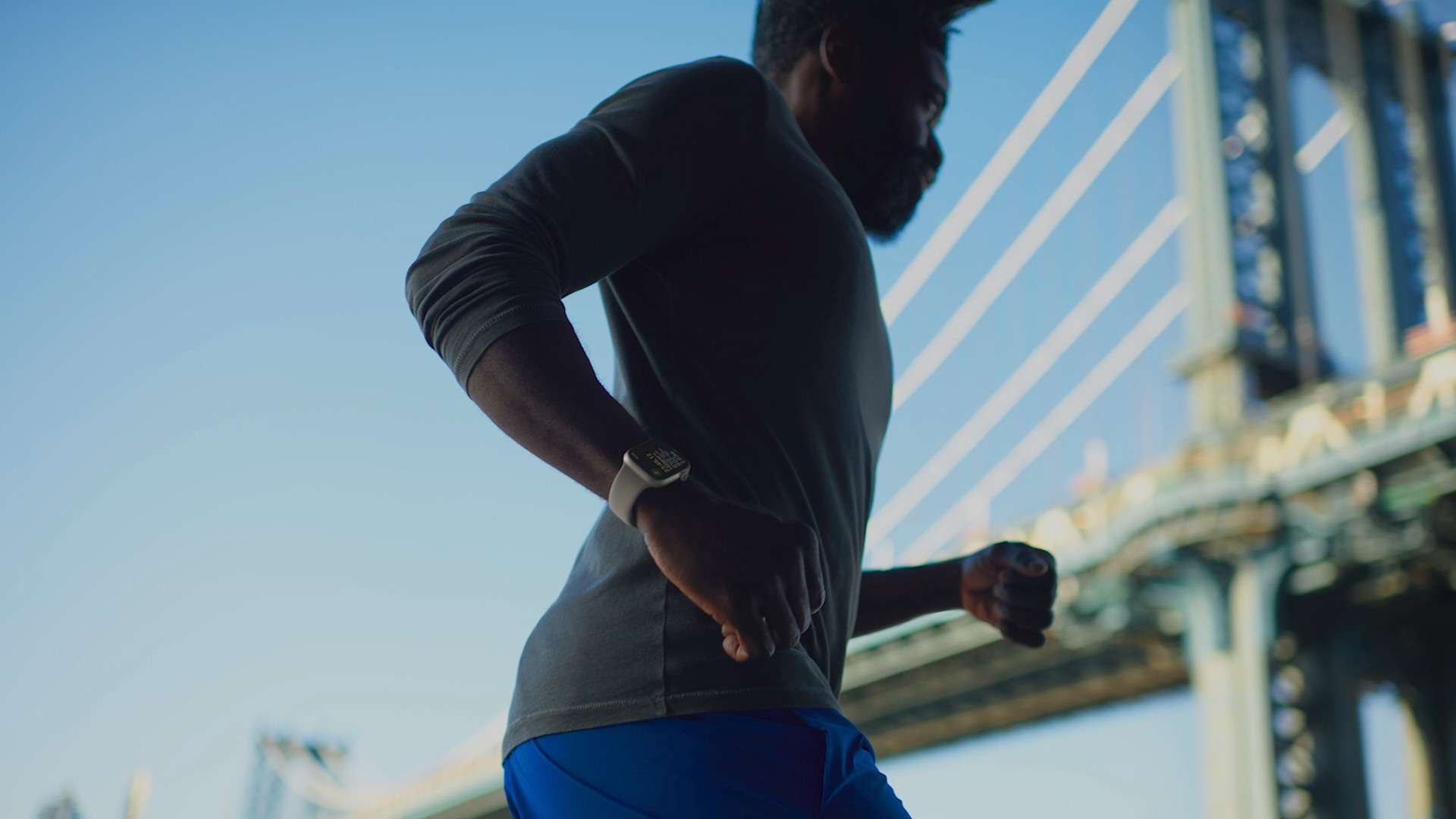 man running bridge