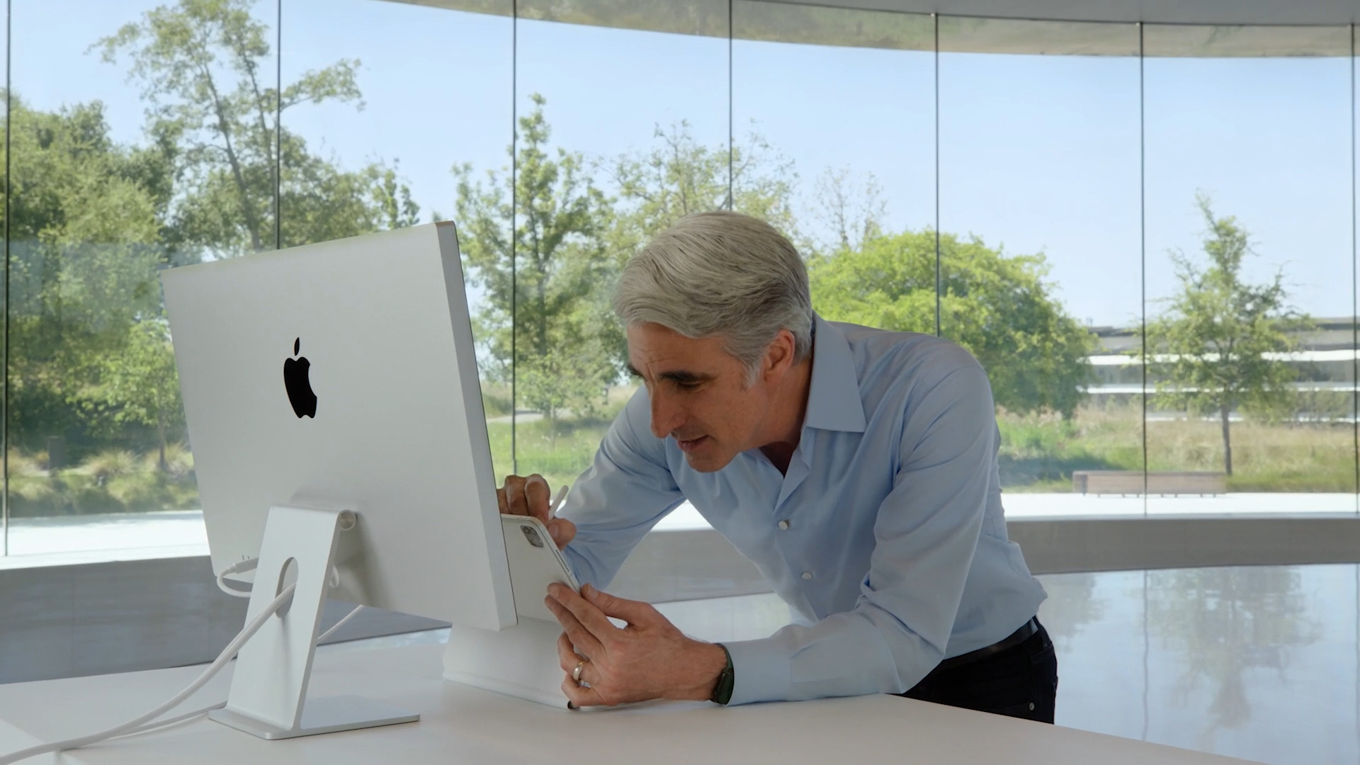 person connecting imac