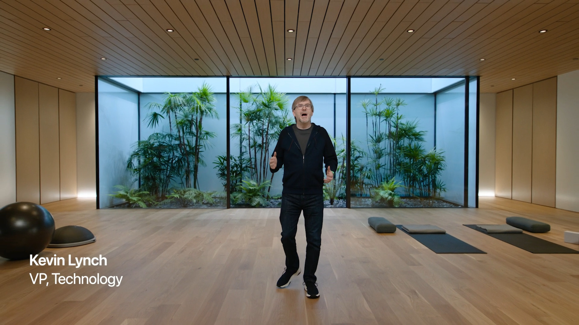 person in modern room with plants