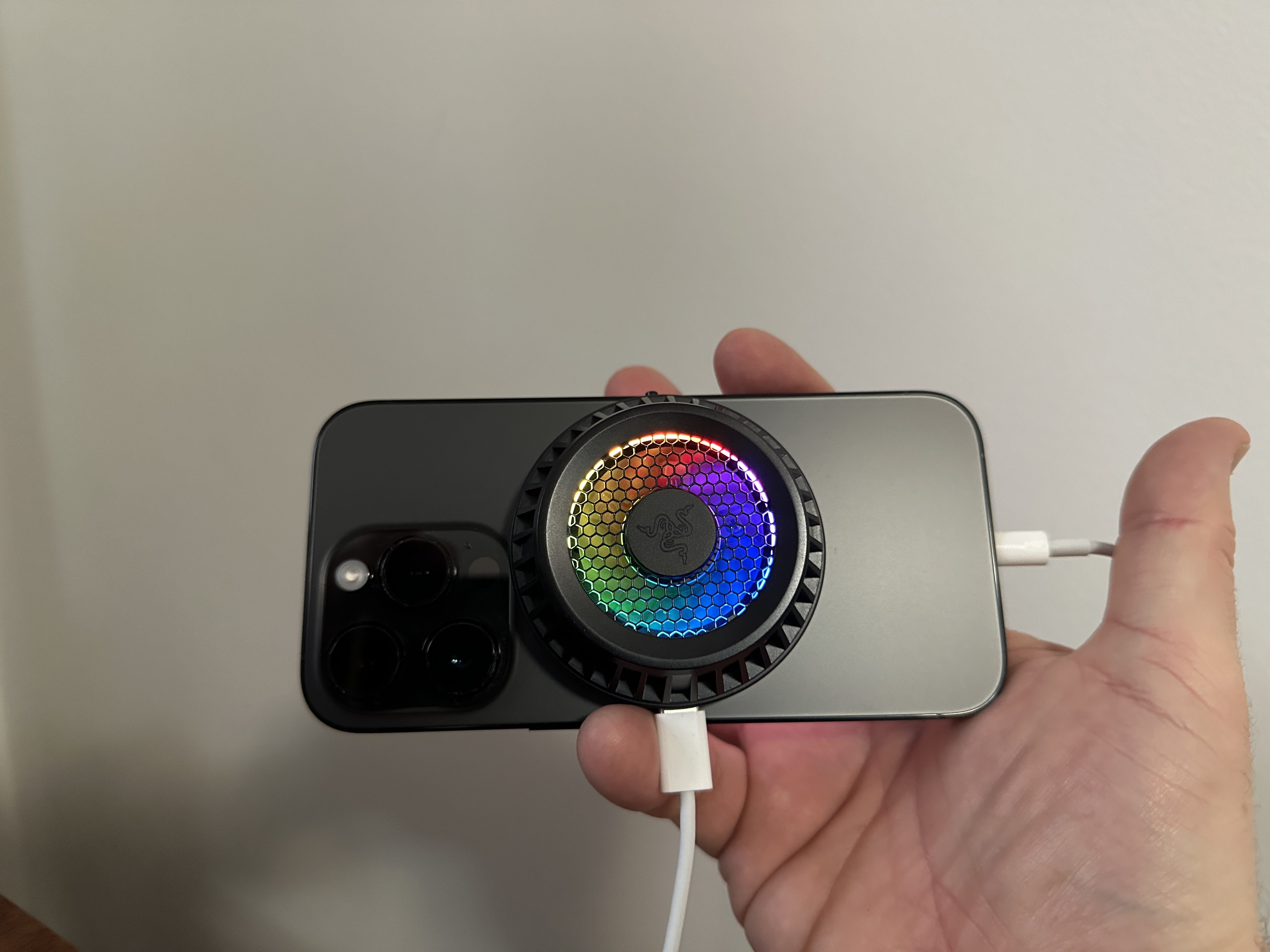 hand holding phone cooler