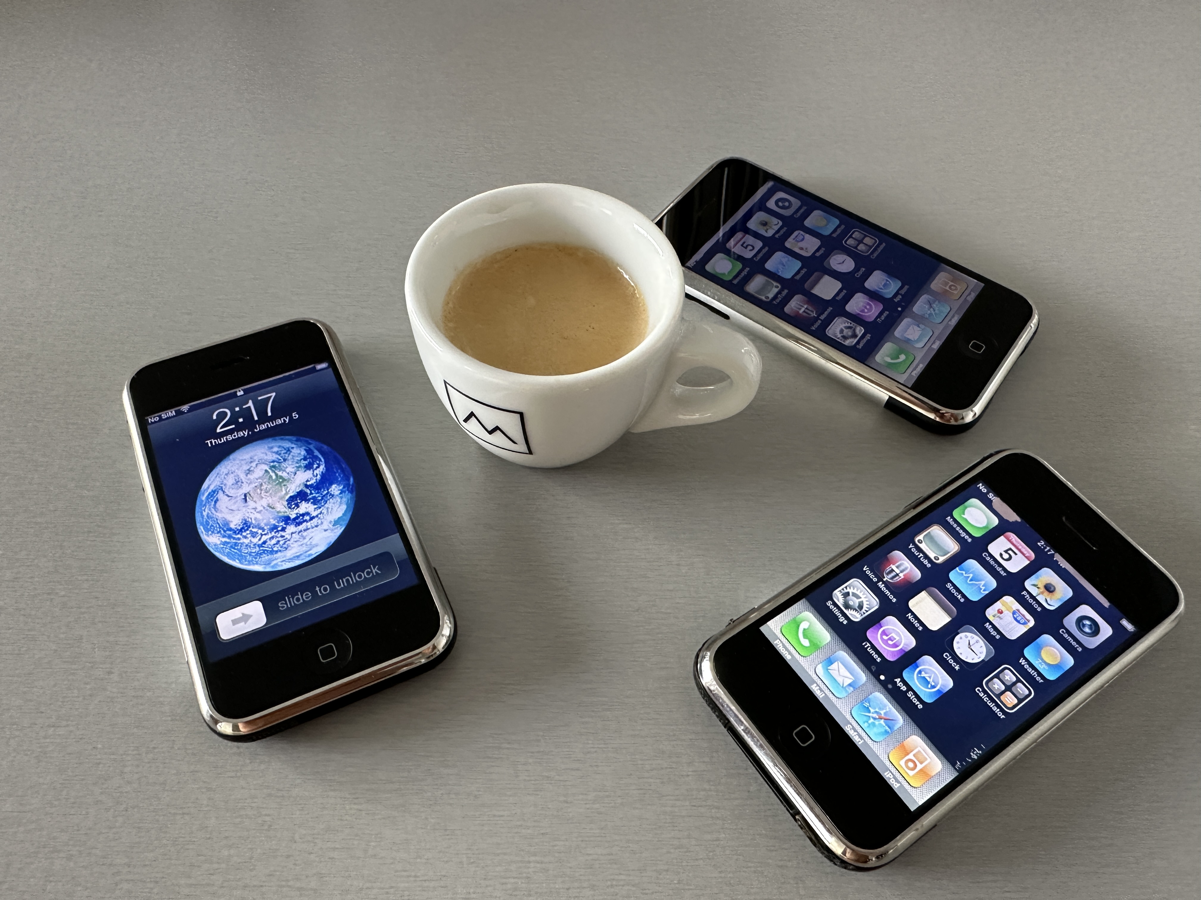 iphones with coffee cup